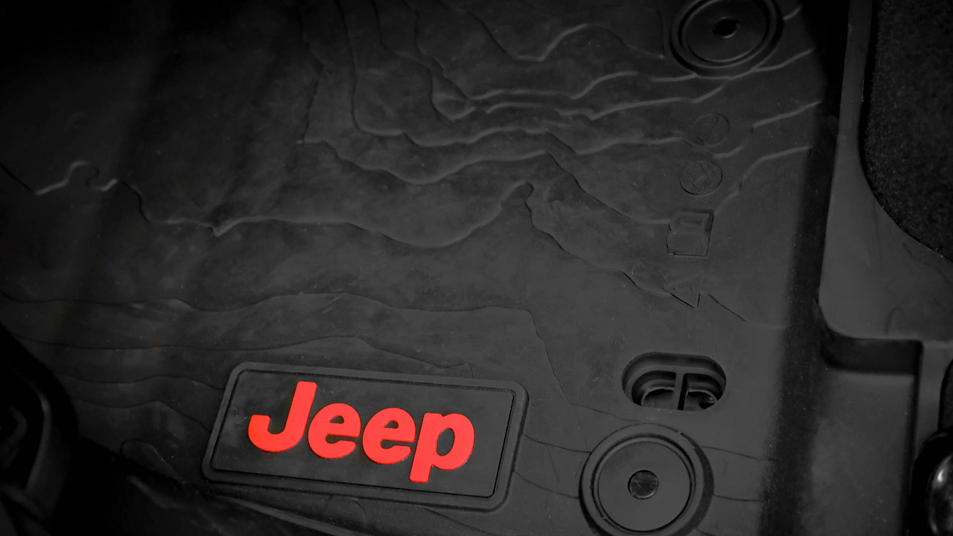 Inside the cabin of the Jeep Top Dog Concept, Mopar all-weather floor mats are installed throughout the cabin area.