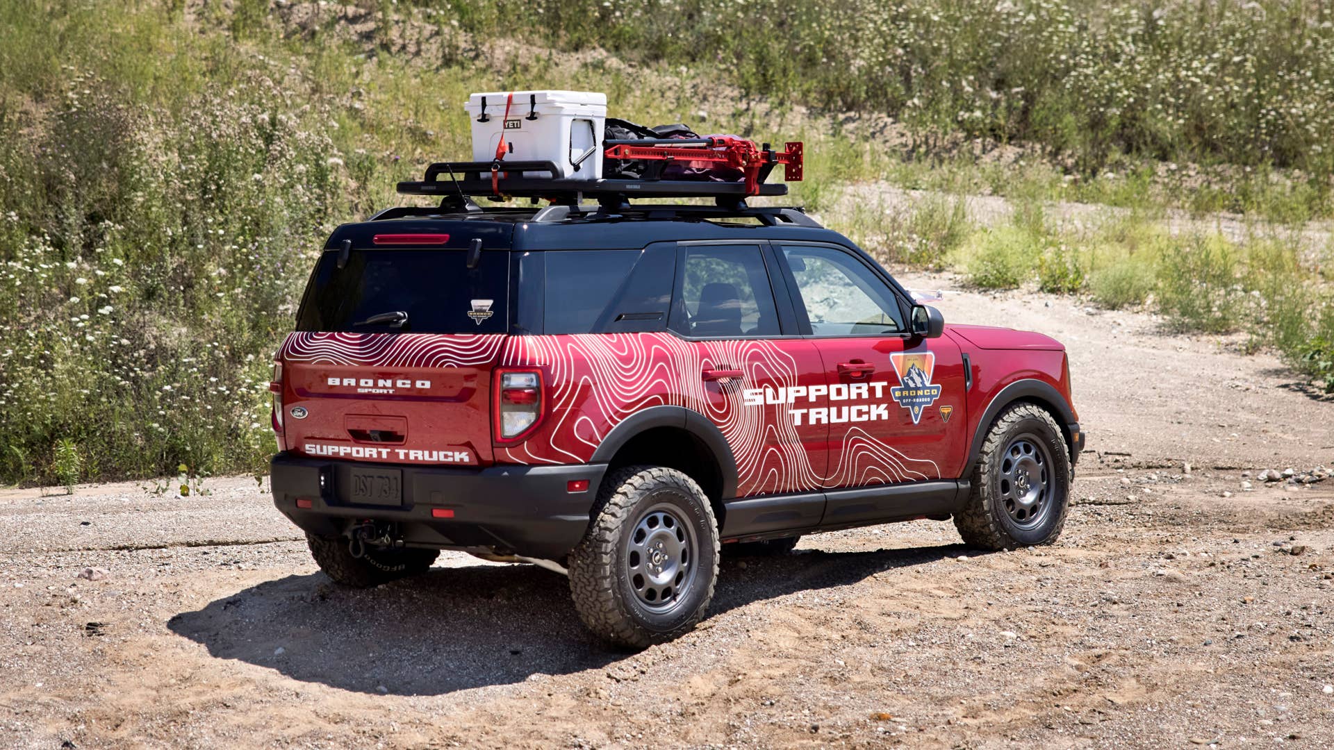 Bronco Sport Off-Roadeo Adventure Patrol. Designed for the upcoming Bronco Off-Roadeo customer adventure playgrounds, this Bronco Sport Badlands build is equipped to assist in the wild with its Yakima LockNLoad Cargo Platform to hold recovery gear like a high-lift jack, recovery boards and jerry cans. A Ford Performance by RIGID off-road LED lightbar* also mounts to the rack system. To support one of many Off-Roadeo excursions available, this Bronco Sport is equipped with the interior bike rack* from Yakima to hold two mountain bikes. And to record customers’ adventures, it integrates a target to land the drone that will be used on-trail at Off-Roadeo locations. (Preproduction image with optional features shown. Available late 2020.)(*available spring 2021)