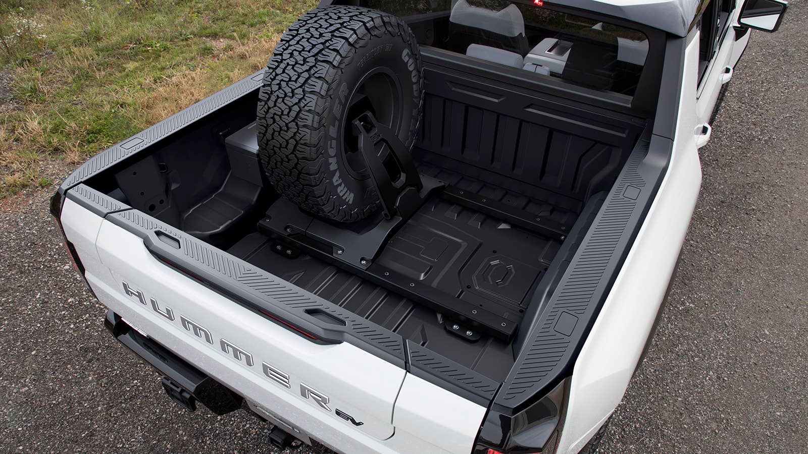 GMC HUMMER EV bed-mounted vertical spare tire carrier