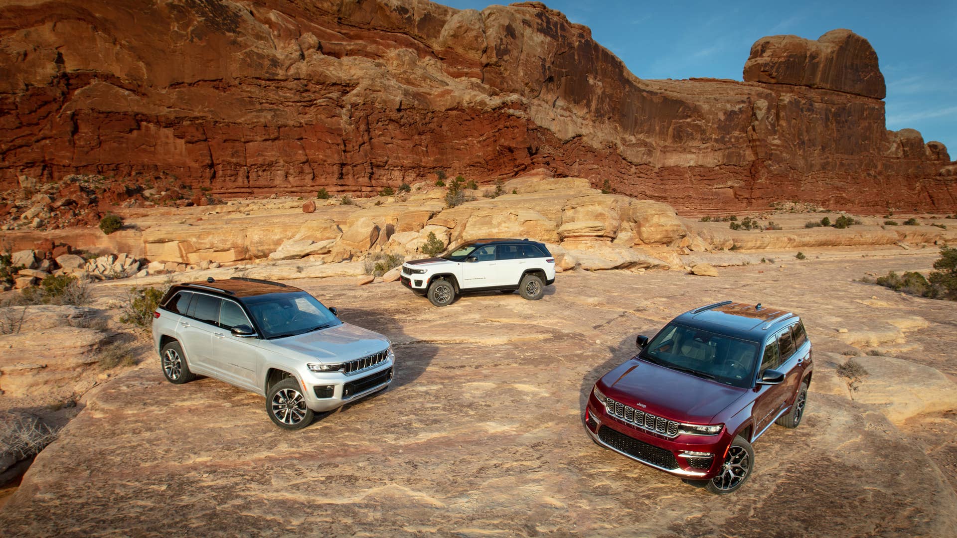 All-new 2022 Jeep® Grand Cherokee (from left to right): Overland, Trailhawk and Summit Reserve