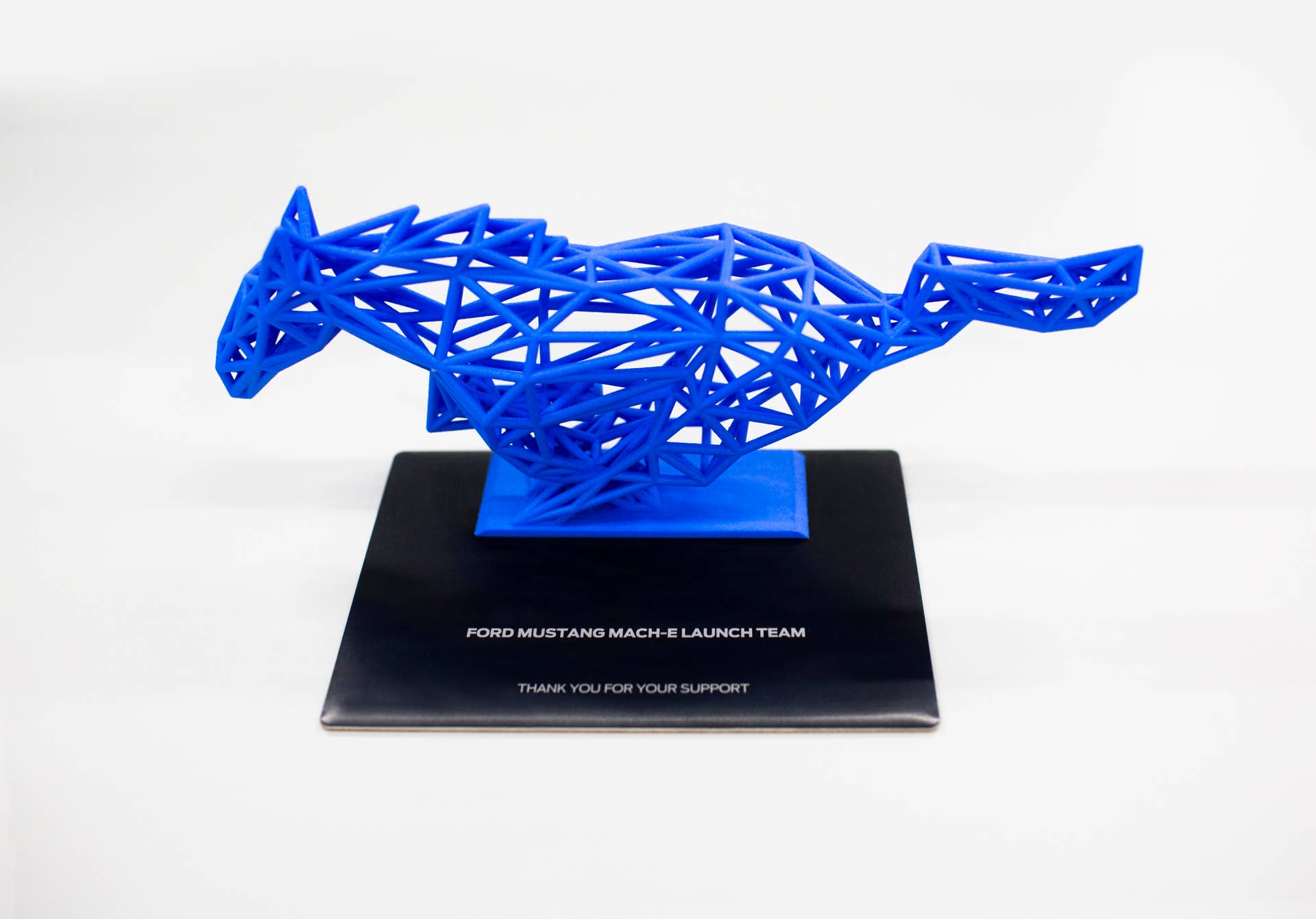 Each Mustang Mach-E First Edition customer will receive a special collectible wireframe pony sculpture in the color corresponding to their vehicle’s paint job, created with the help of 3D printing.