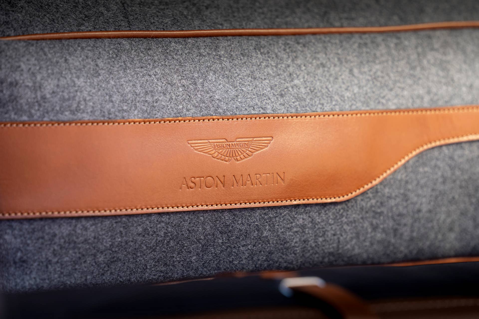 The first SUV from Aston Martin is powered by a twin-turbo V8 producing 542 hp and 516 ft.-lb of torque, getting from 0 to 60mph in 4.3 seconds.