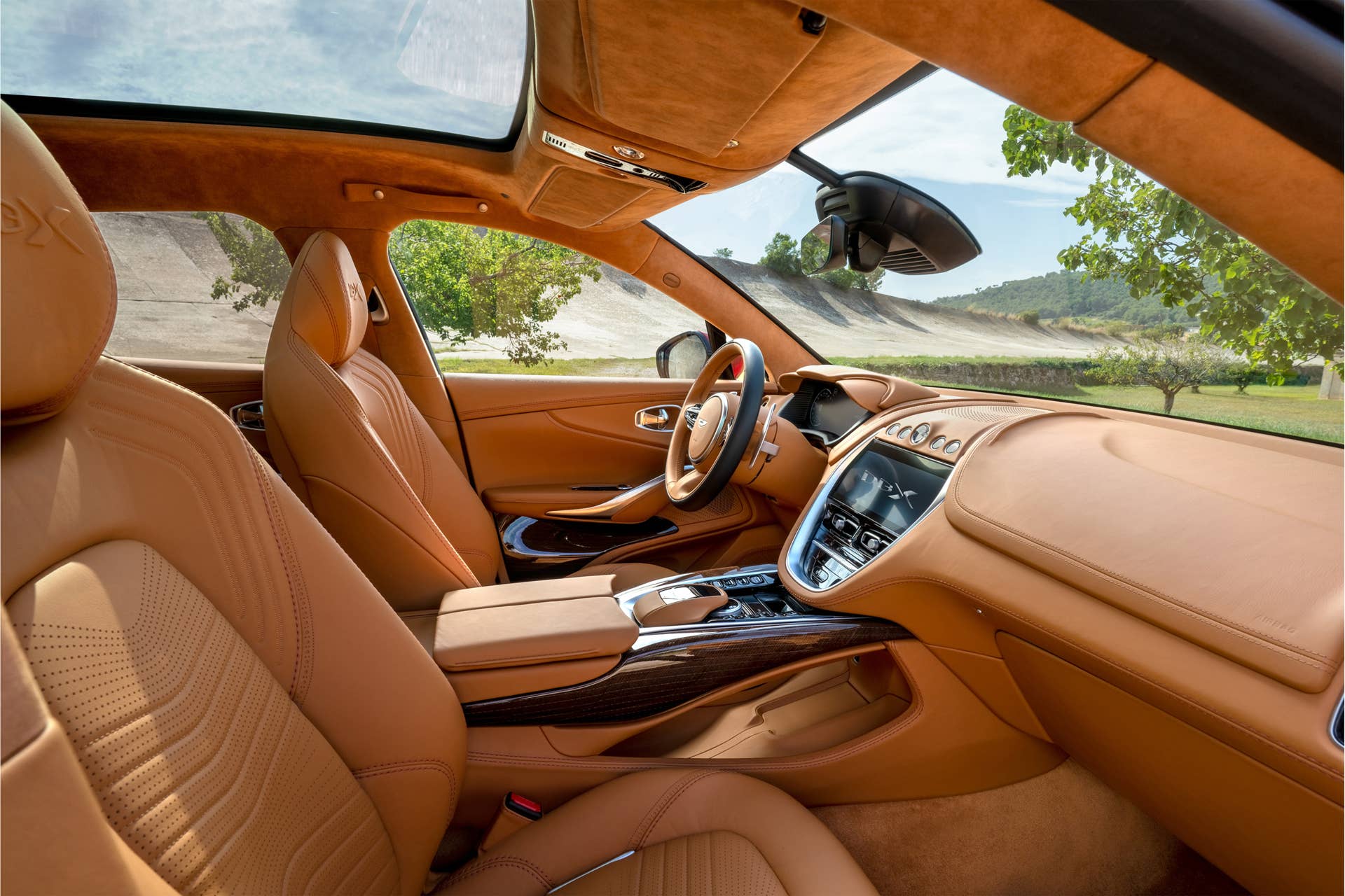 The first SUV from Aston Martin is powered by a twin-turbo V8 producing 542 hp and 516 ft.-lb of torque, getting from 0 to 60mph in 4.3 seconds.