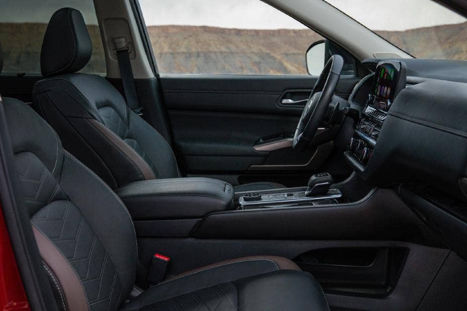 The interior of the all-new adventure-ready Pathfinder features refined new materials and a robust, open design. Driver and passengers are greeted with a modern, spaciousness environment.