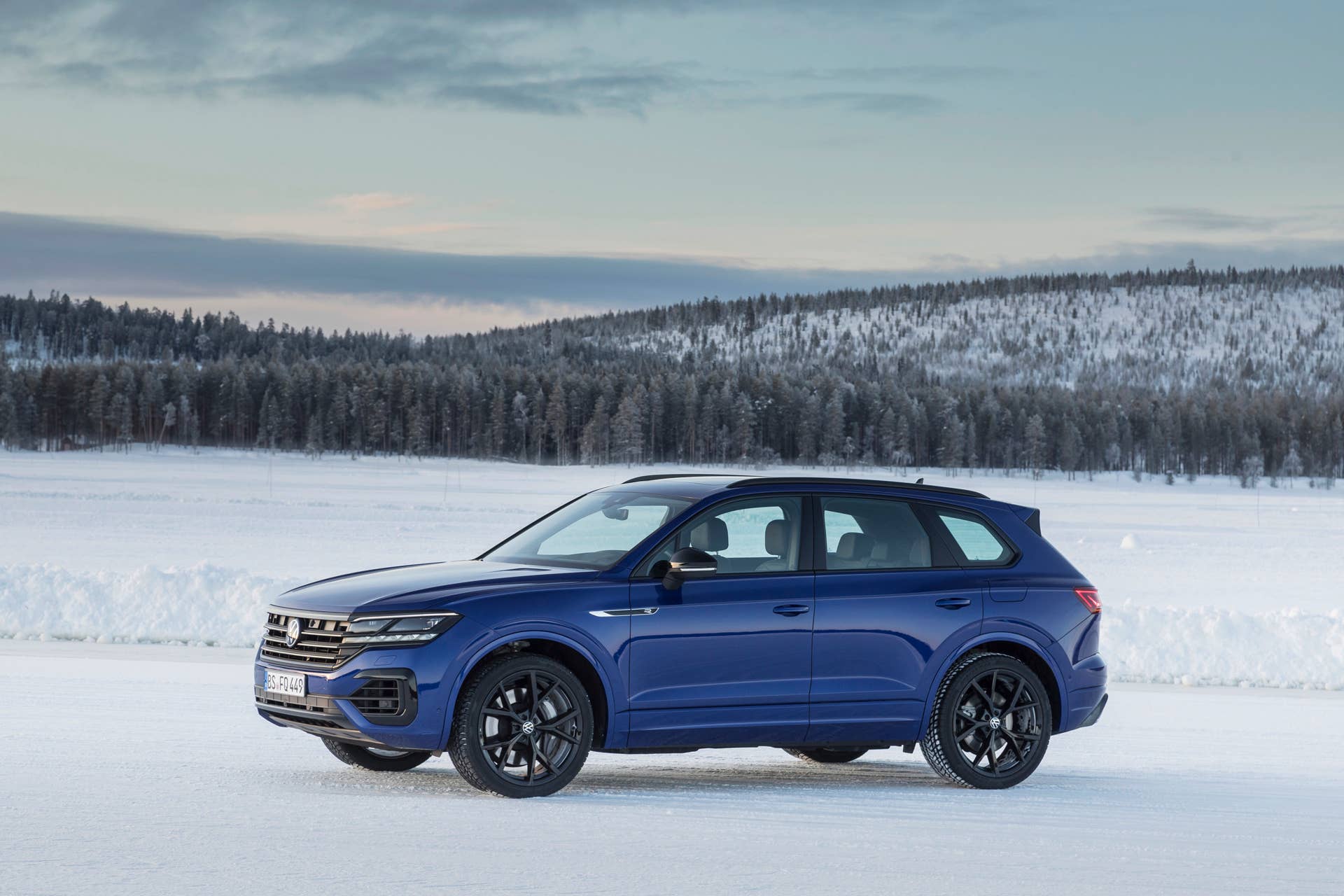 Volkswgaen launches its first plug-in hybrid R car, the Touareg R with a 456-hp powertrain and all-wheel drive.