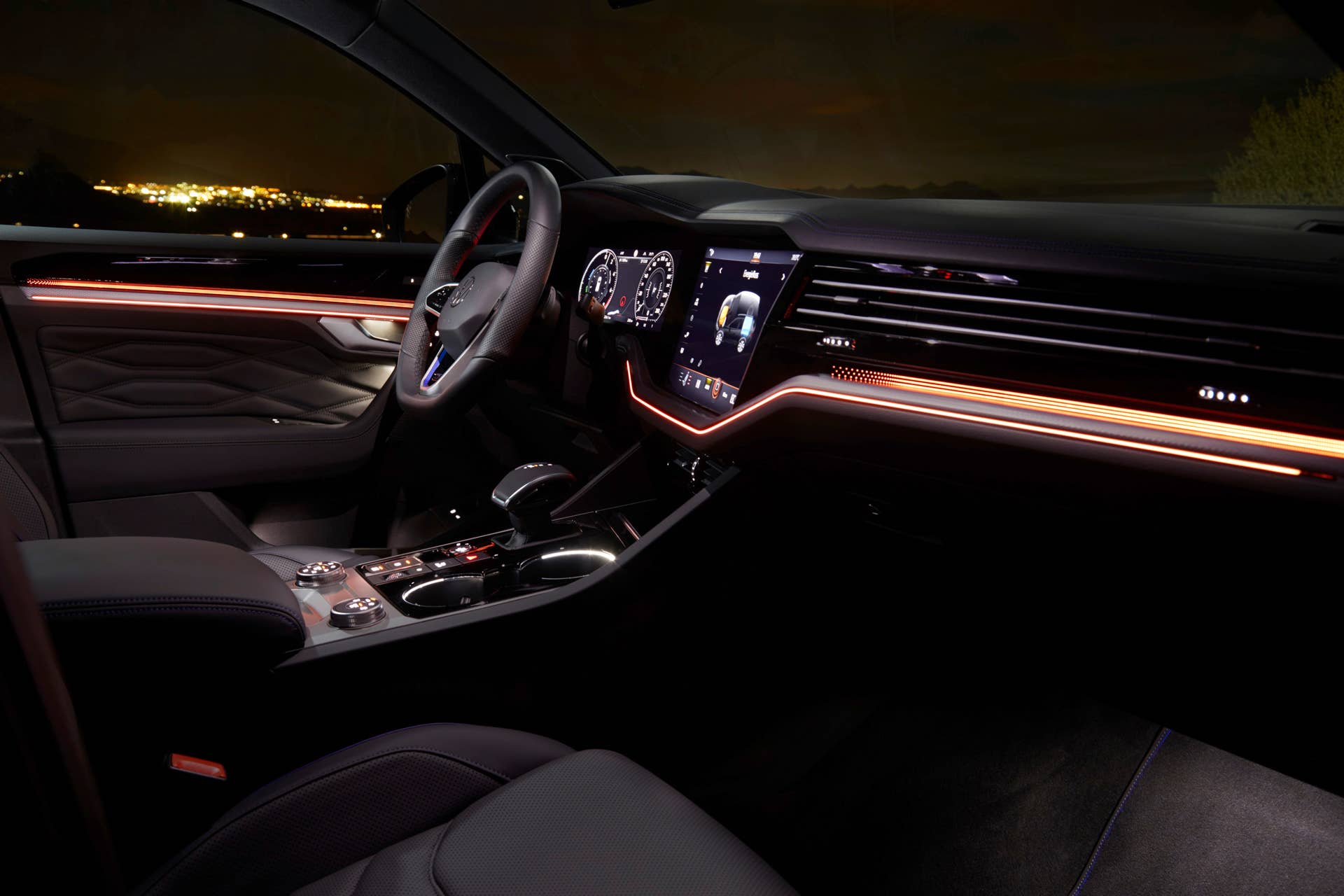 Volkswgaen launches its first plug-in hybrid R car, the Touareg R with a 456-hp powertrain and all-wheel drive.