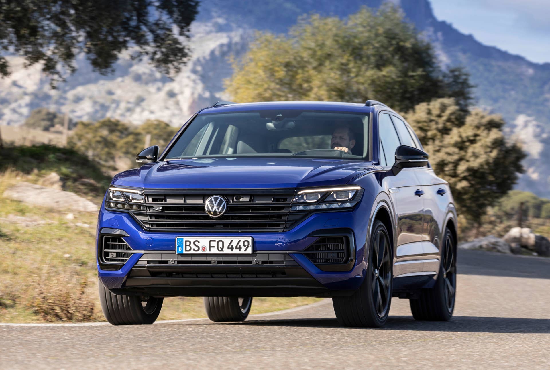 Volkswgaen launches its first plug-in hybrid R car, the Touareg R with a 456-hp powertrain and all-wheel drive.
