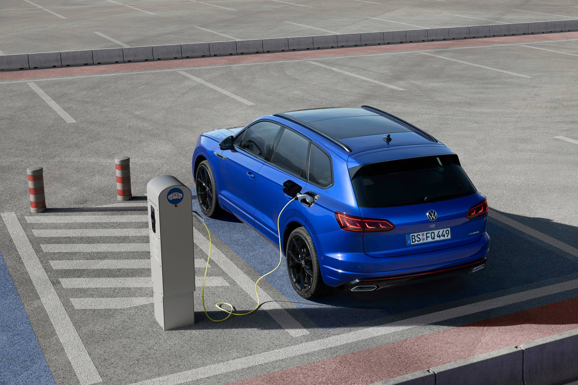 Volkswgaen launches its first plug-in hybrid R car, the Touareg R with a 456-hp powertrain and all-wheel drive.