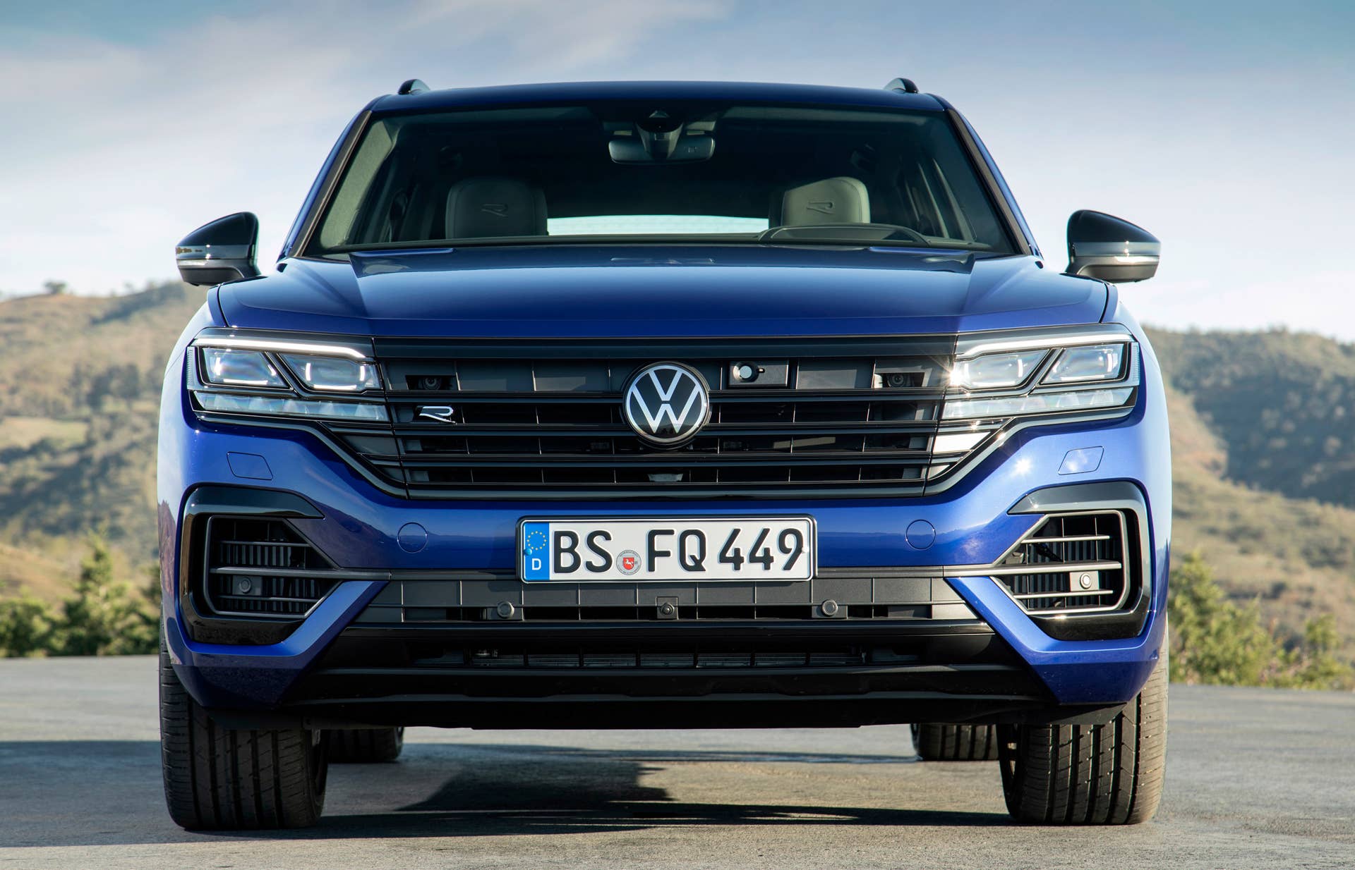 Volkswgaen launches its first plug-in hybrid R car, the Touareg R with a 456-hp powertrain and all-wheel drive.