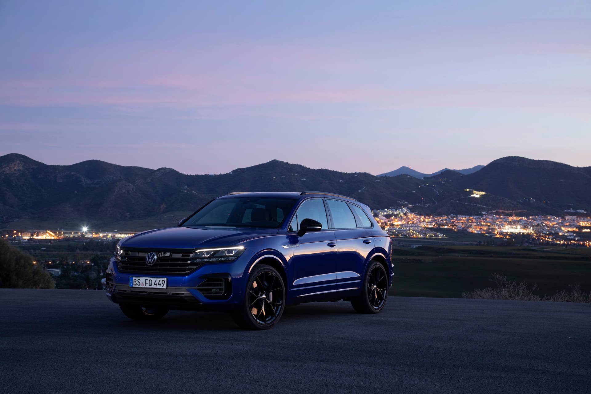 Volkswgaen launches its first plug-in hybrid R car, the Touareg R with a 456-hp powertrain and all-wheel drive.