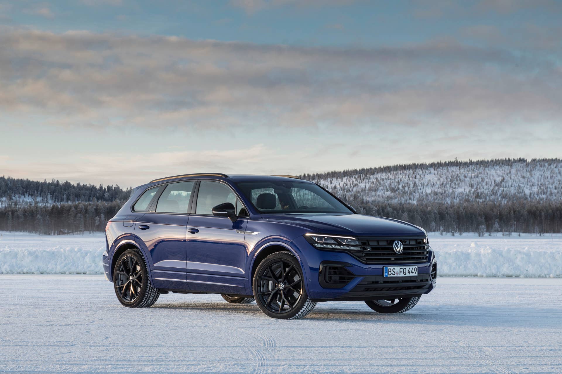 Volkswgaen launches its first plug-in hybrid R car, the Touareg R with a 456-hp powertrain and all-wheel drive.