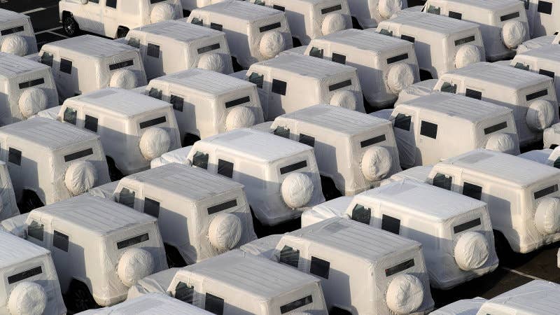 Protective covers sit on Mercedes-Benz AG AMG SUVs on the dockside ahead of export from the the BLG Logistics Group AG terminal at the Port of Bremerhaven in Bremerhaven, Germany, on Tuesday, Jan. 22, 2019. Investor confidence in Germany's growth outlook improved at the start of the year amid hopes that growth will stabilize after a turbulent 2018. Photographer: Krisztian Bocsi/Bloomberg via Getty Images