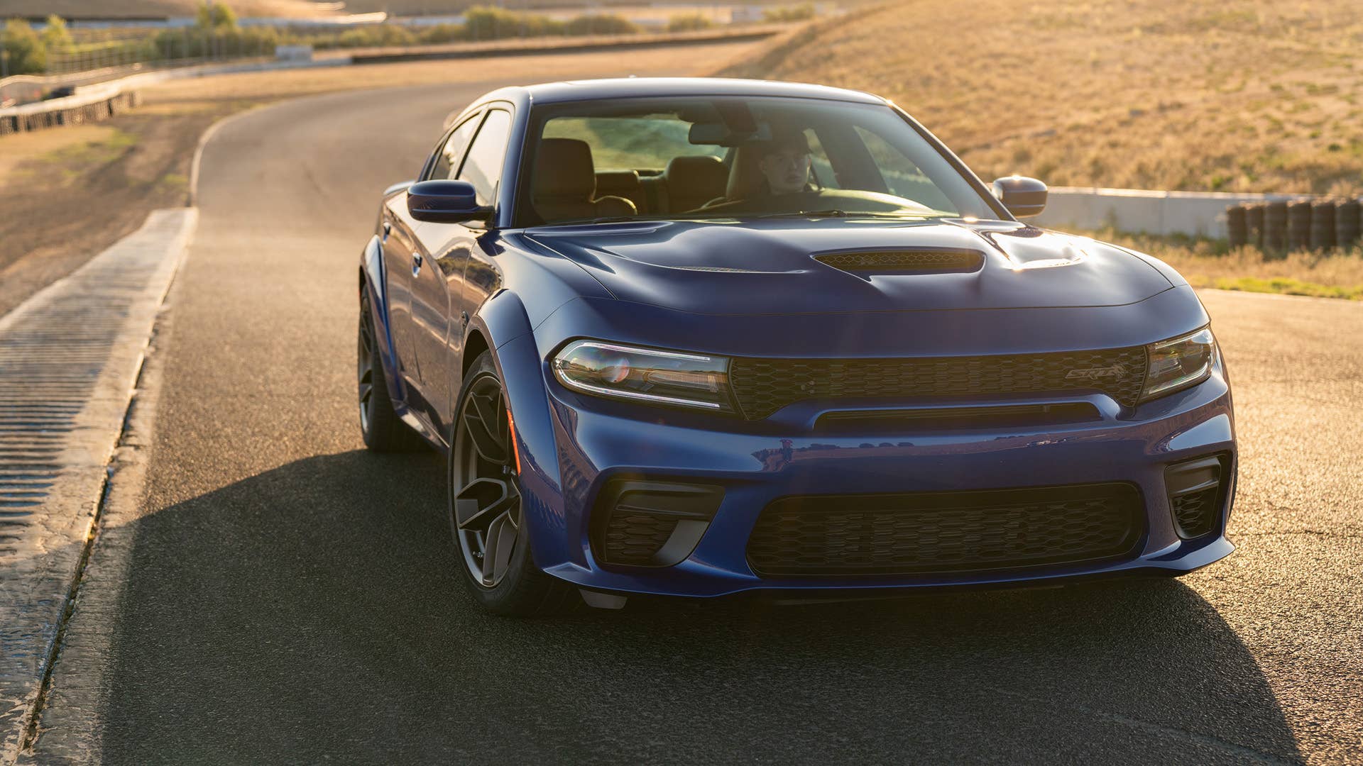 The 2020 Dodge Charger SRT Hellcat Widebody is powered by the proven supercharged 6.2-liter HEMI Hellcat V-8 engine, which delivers a best-in-class 707 horsepower and 650 lb.-ft. of torque.