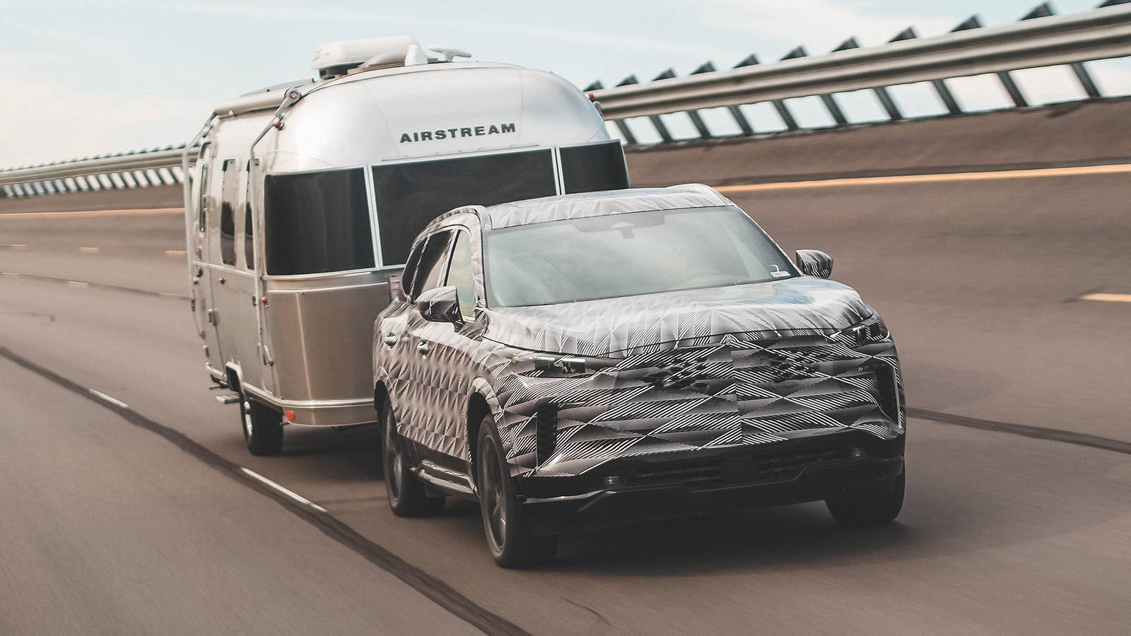 Infiniti QX60 towing an Airstream trailer