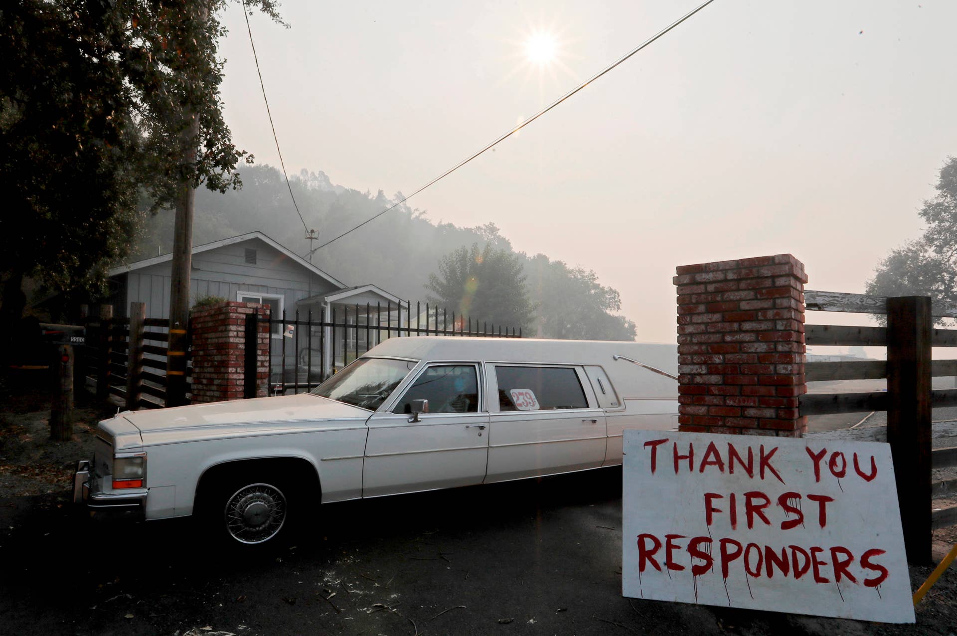 HEALDSBURG, CA - OCTOBER 28: A sign and hearse give a nod to Halloween and firefighters along Faught Road in Windsor on Monday, Oct. 28, 2019. (Photo by Luis Sinco/Los Angeles Times via Getty Images)