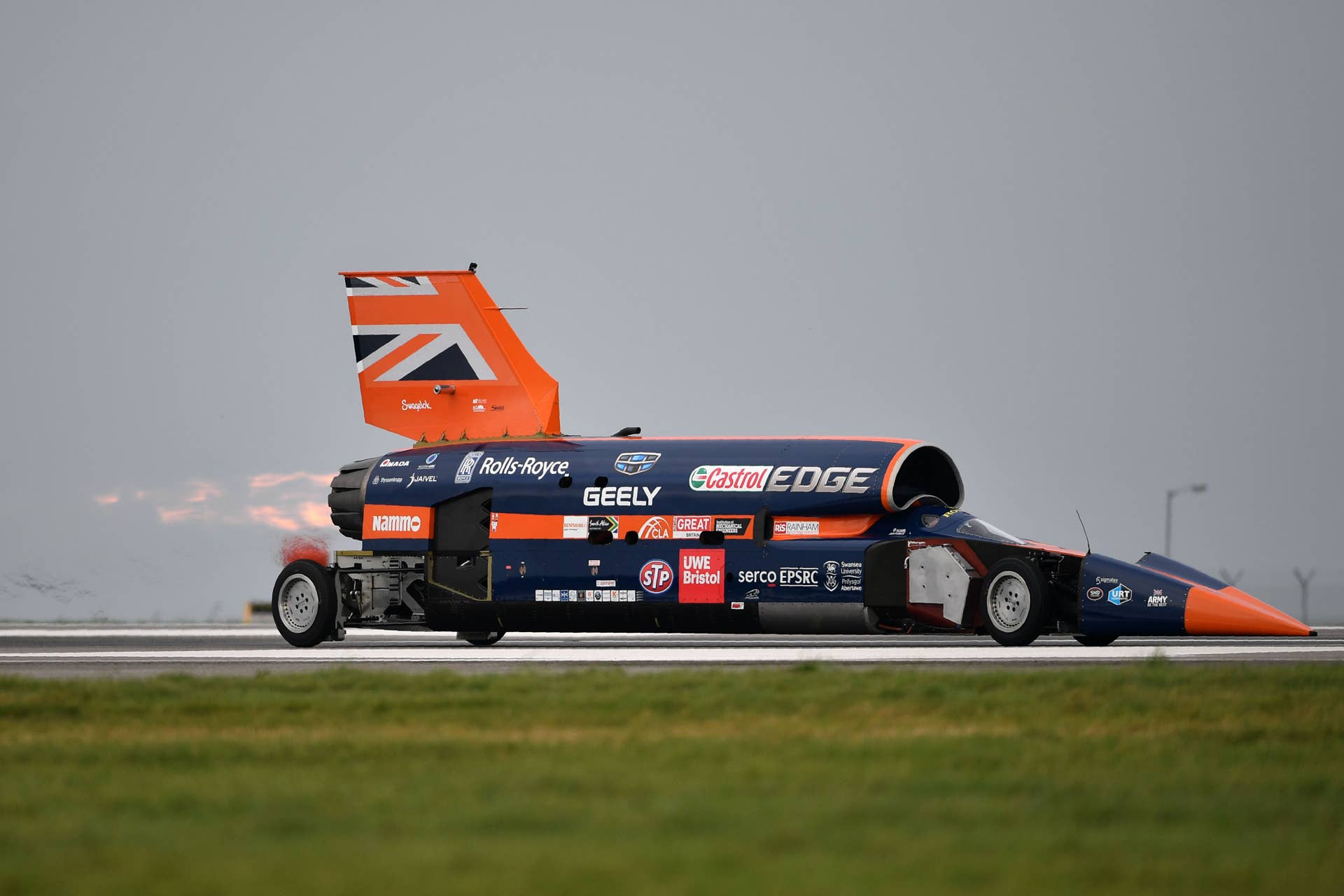 The Bloodhound supersonic car, driven by Andy Green, Royal Air Force Wing Commander, makes a test run at the airport in Newquay on October 26, 2017. The Bloodhound SSC will be conducting its first high-speed trials today with the aim of breaking the world land speed record in South Africa in 2019. / AFP PHOTO / Ben STANSALL (Photo credit should read BEN STANSALL/AFP/Getty Images)