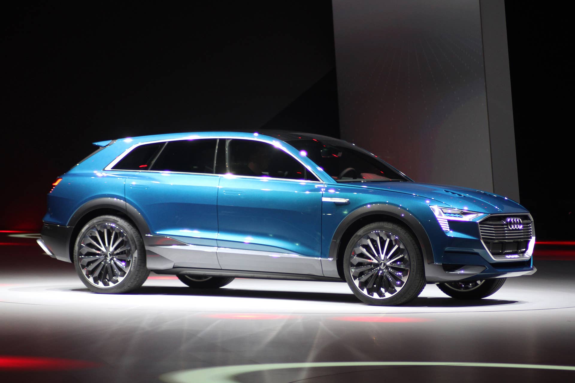 The Audi E-Tron Quattro concept is revealed to the press at Volkswagen Group Night ahead of the 2015 Frankfurt Motor Show, front three-quarter view, passenger side.