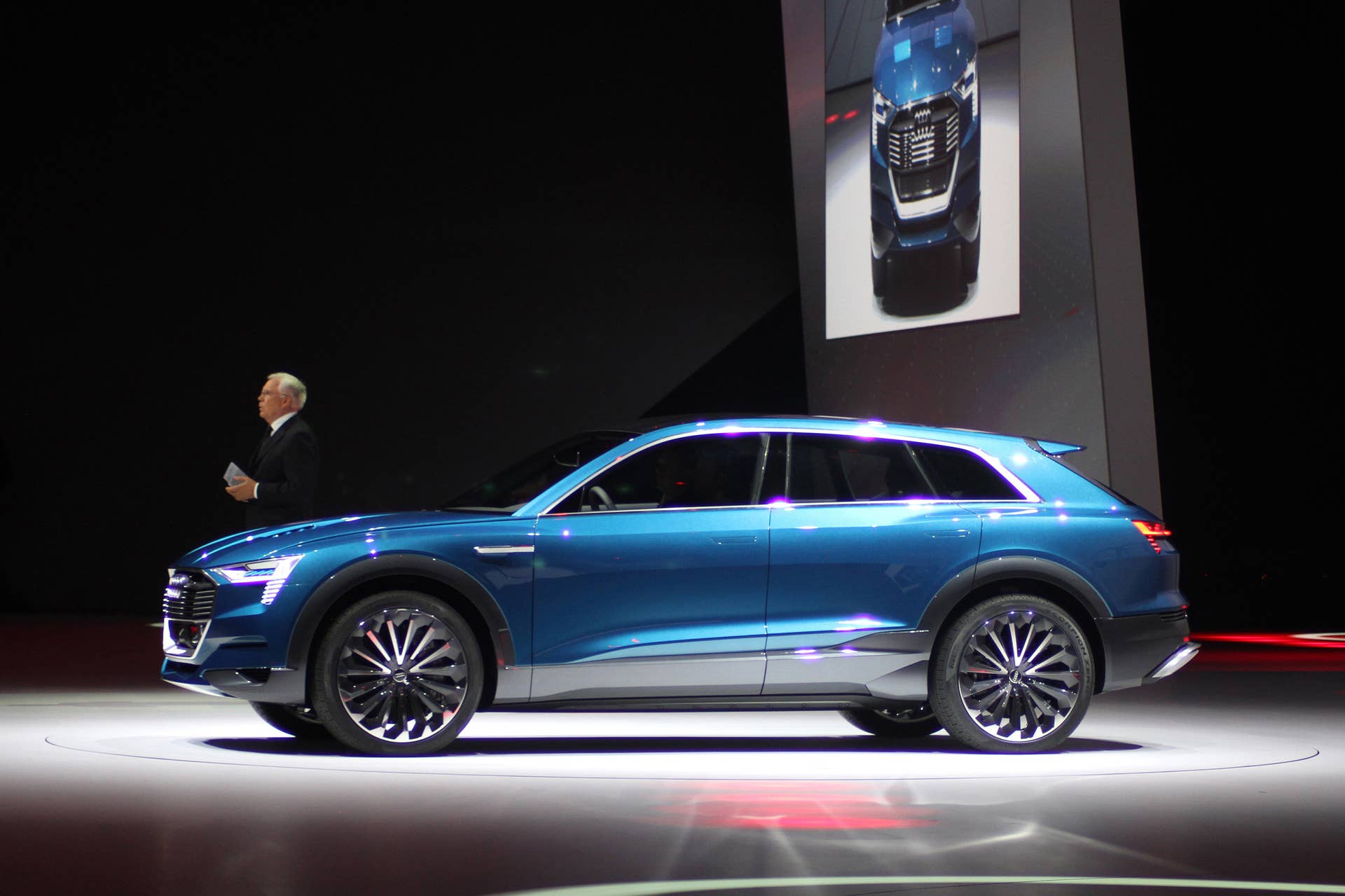 The Audi E-Tron Quattro concept is revealed to the press at Volkswagen Group Night ahead of the 2015 Frankfurt Motor Show, side view with Ulrich Hackenberg.