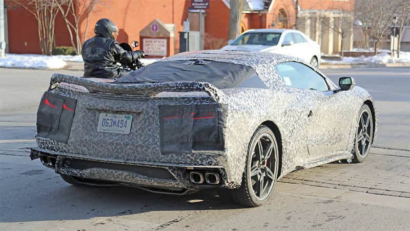 Rear three-quarter spy shot of the mid-engined C8 Corvette.
