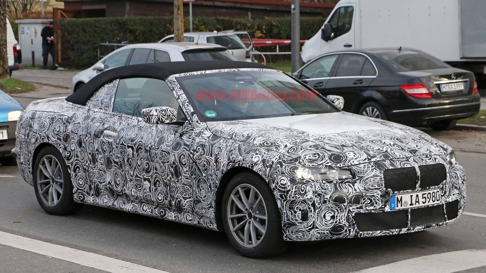Our photographer caught the droptop in road testing.