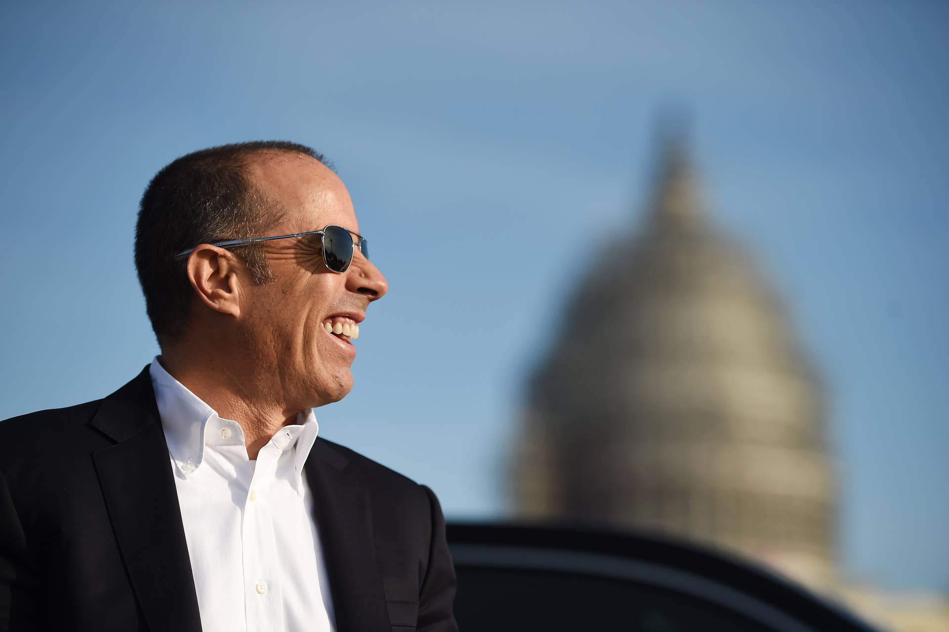 WASHINGTON, DC - DECEMBER 06: Jerry Seinfeld waits for the next scene to be filmed for an upcoming episode of the program, 'Comedians in Cars Getting Coffee' on Sunday December 06, 2015 in Washington, DC. (Photo by Matt McClain/ The Washington Post via Getty Images)
