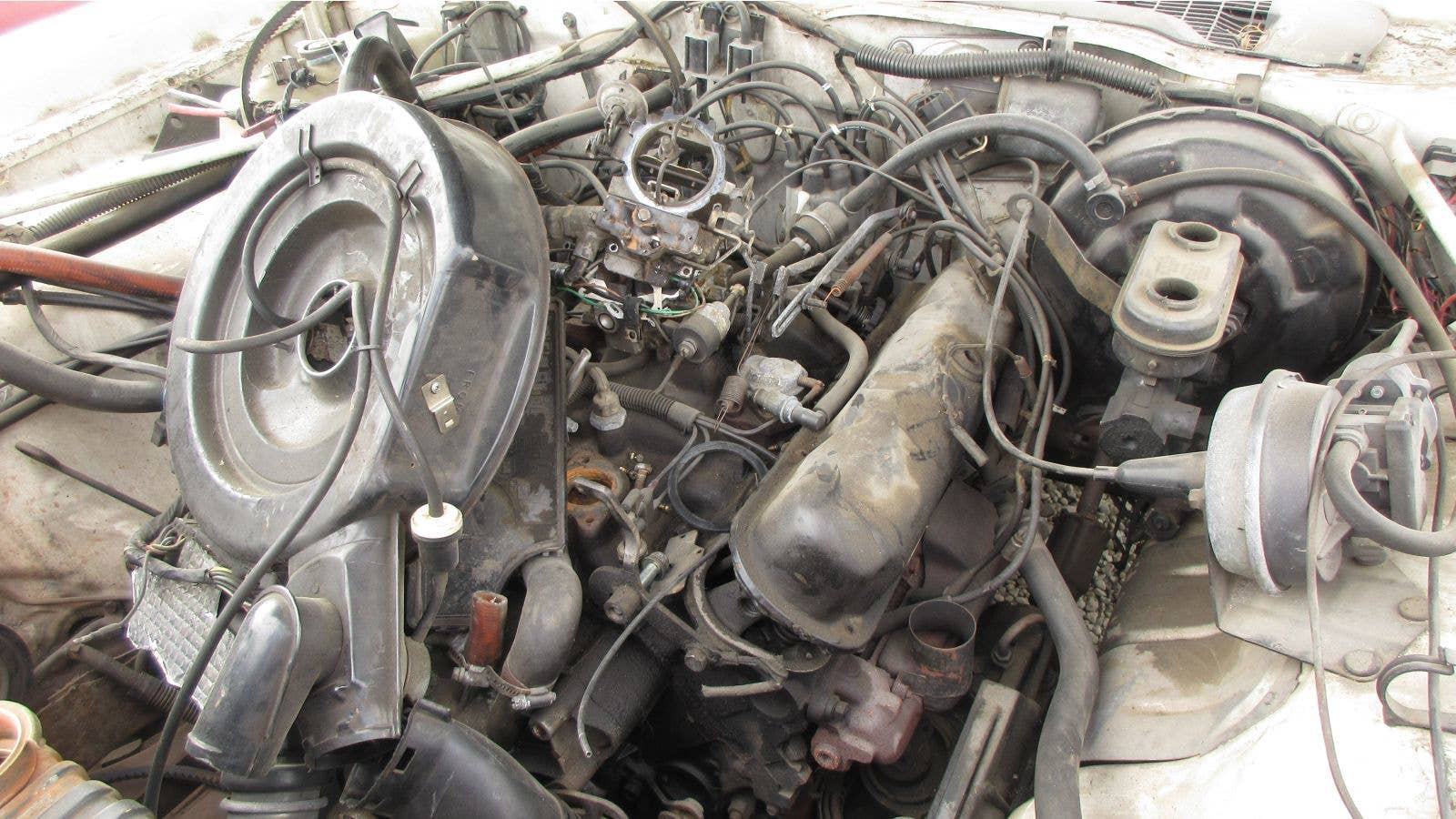 1986 Chrysler Fifth Avenue in California wrecking yard