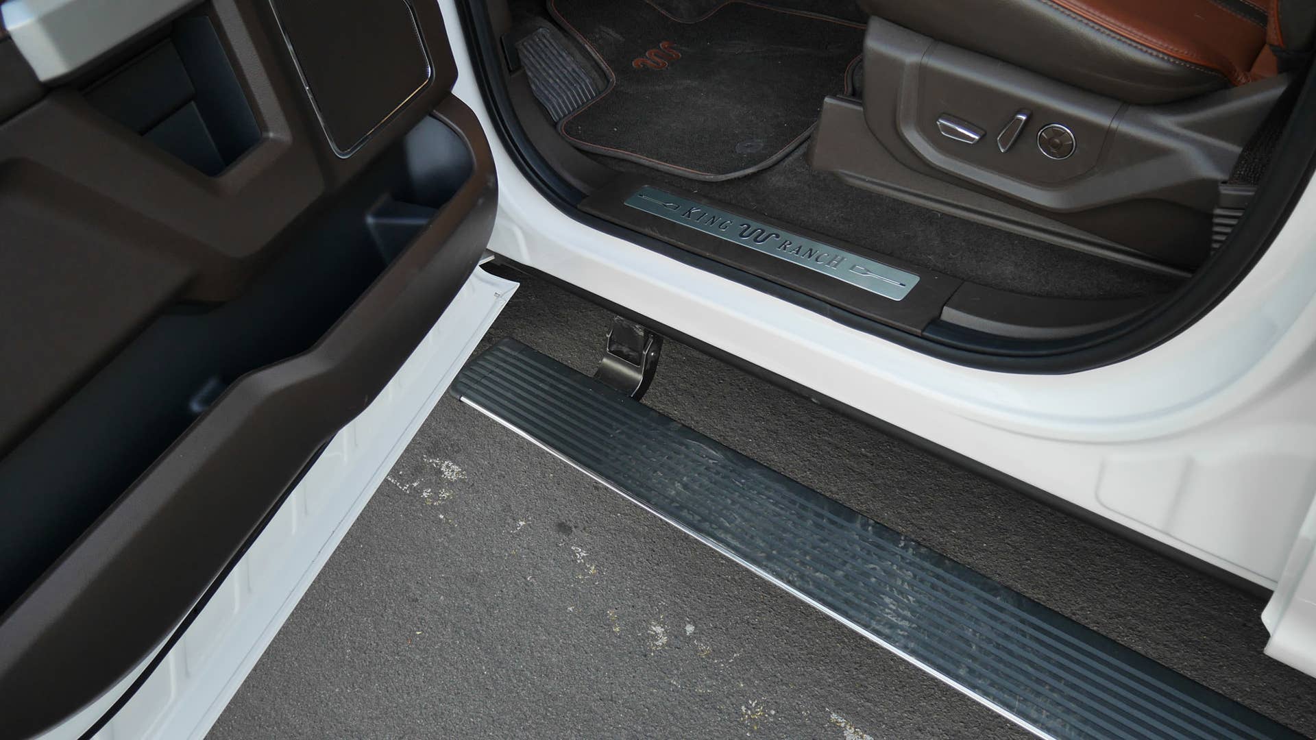 Power-deploying running boards. Brilliant idea.