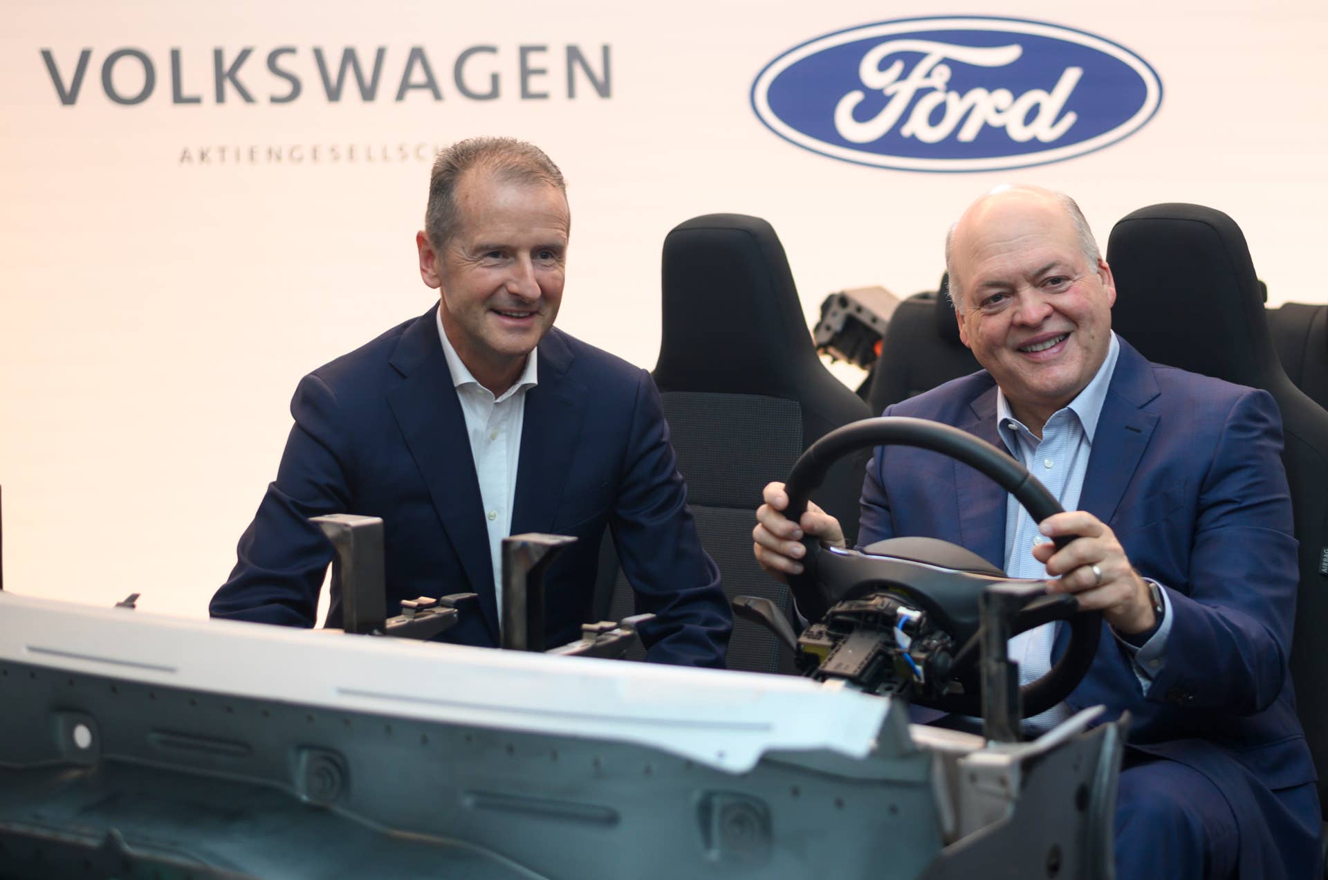 Jim Hackett (R), president and chief executive officer, Ford Motor Company, and Herbert Diess, chief executive officer, Volkswagen Group, pose for a picture ahead of a press conference July 12, 2019 in New York City. (Photo by Johannes EISELE / AFP) (Photo credit should read JOHANNES EISELE/AFP/Getty Images)