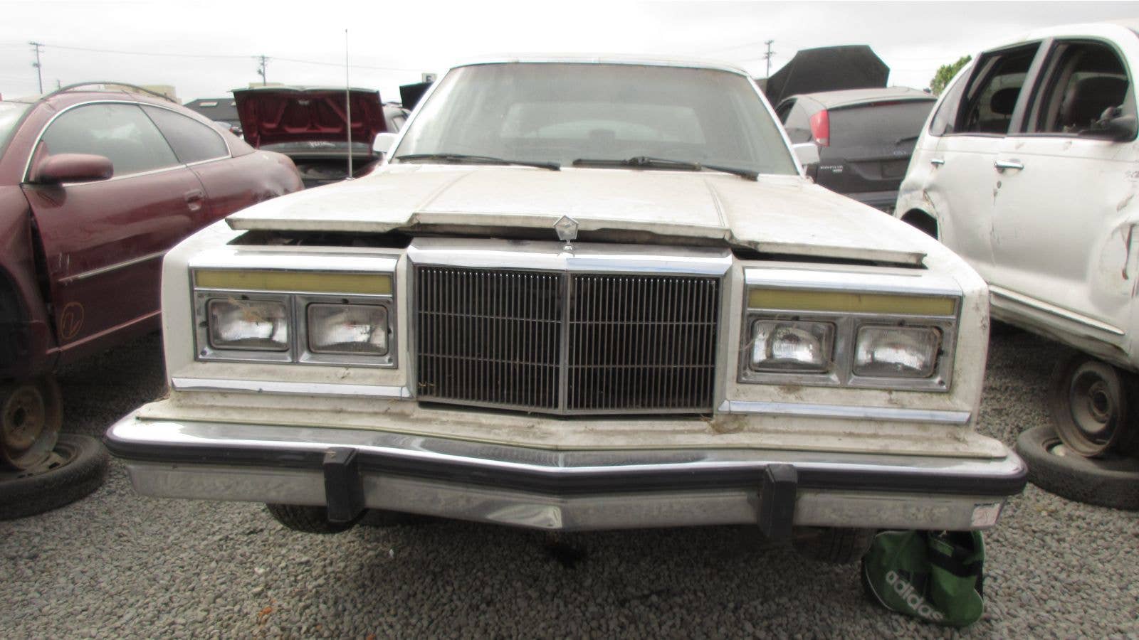 1986 Chrysler Fifth Avenue in California wrecking yard