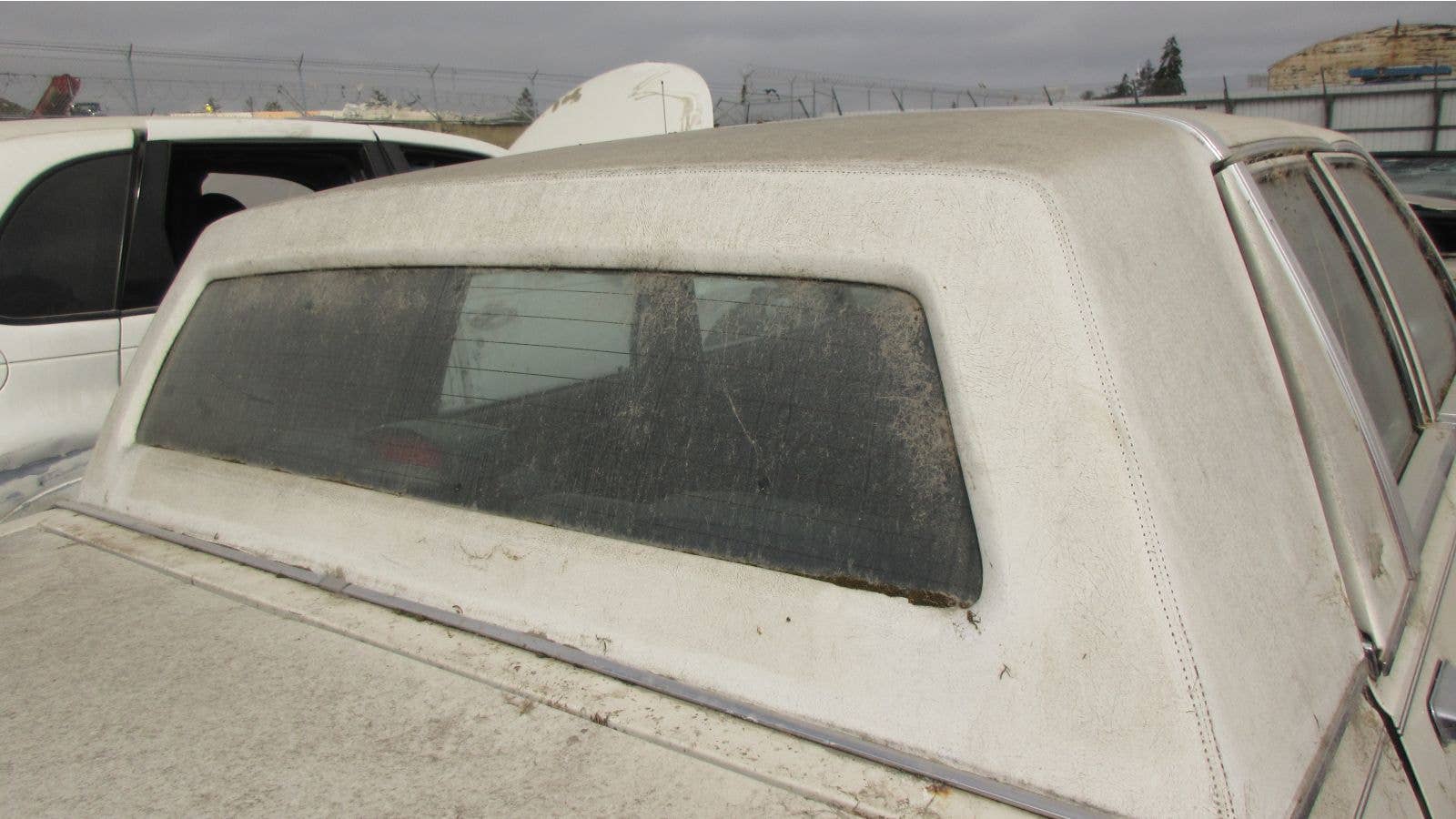 1986 Chrysler Fifth Avenue in California wrecking yard