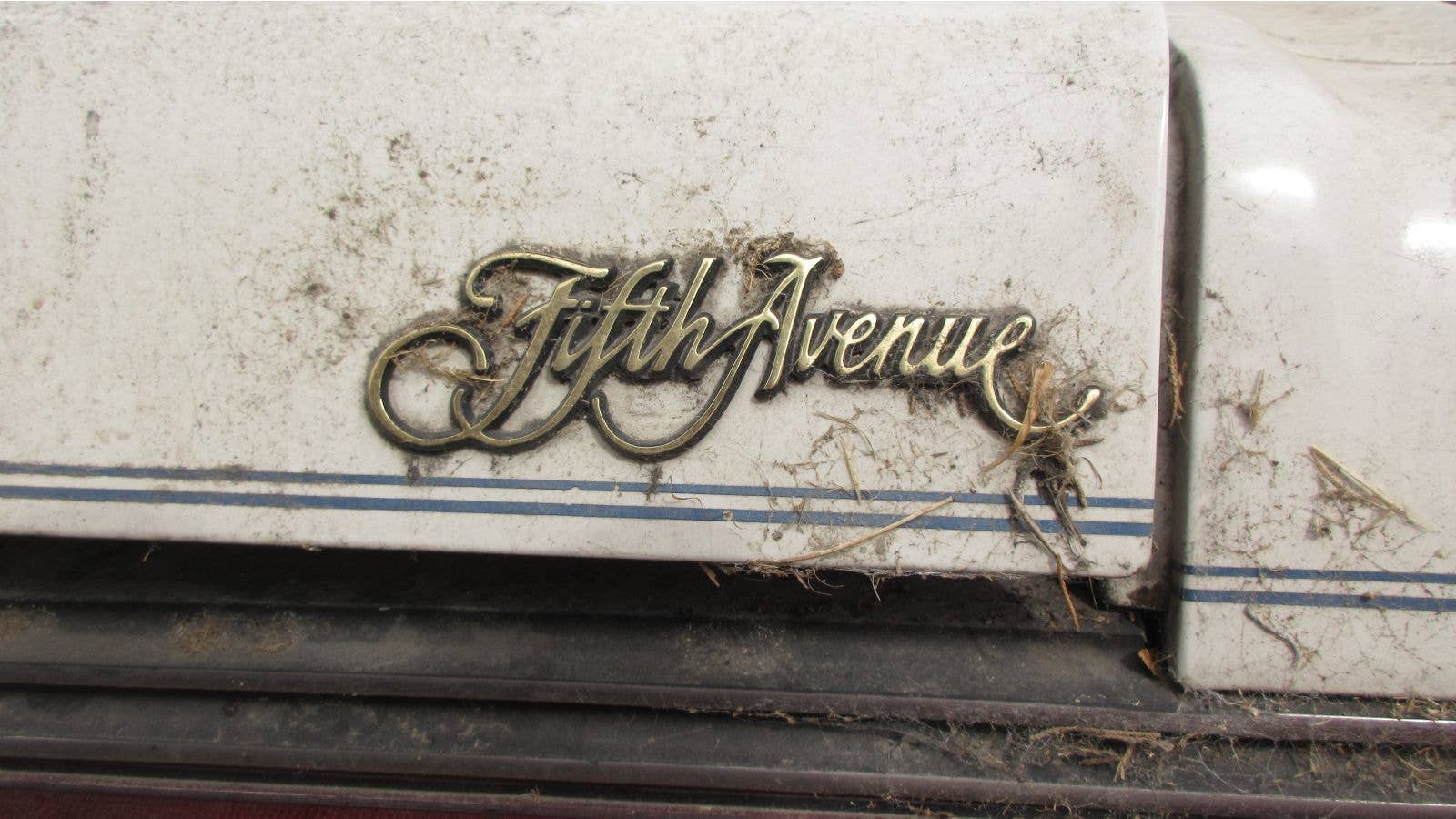 1986 Chrysler Fifth Avenue in California wrecking yard