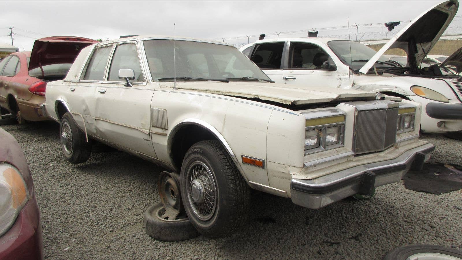 1986 Chrysler Fifth Avenue in California wrecking yard