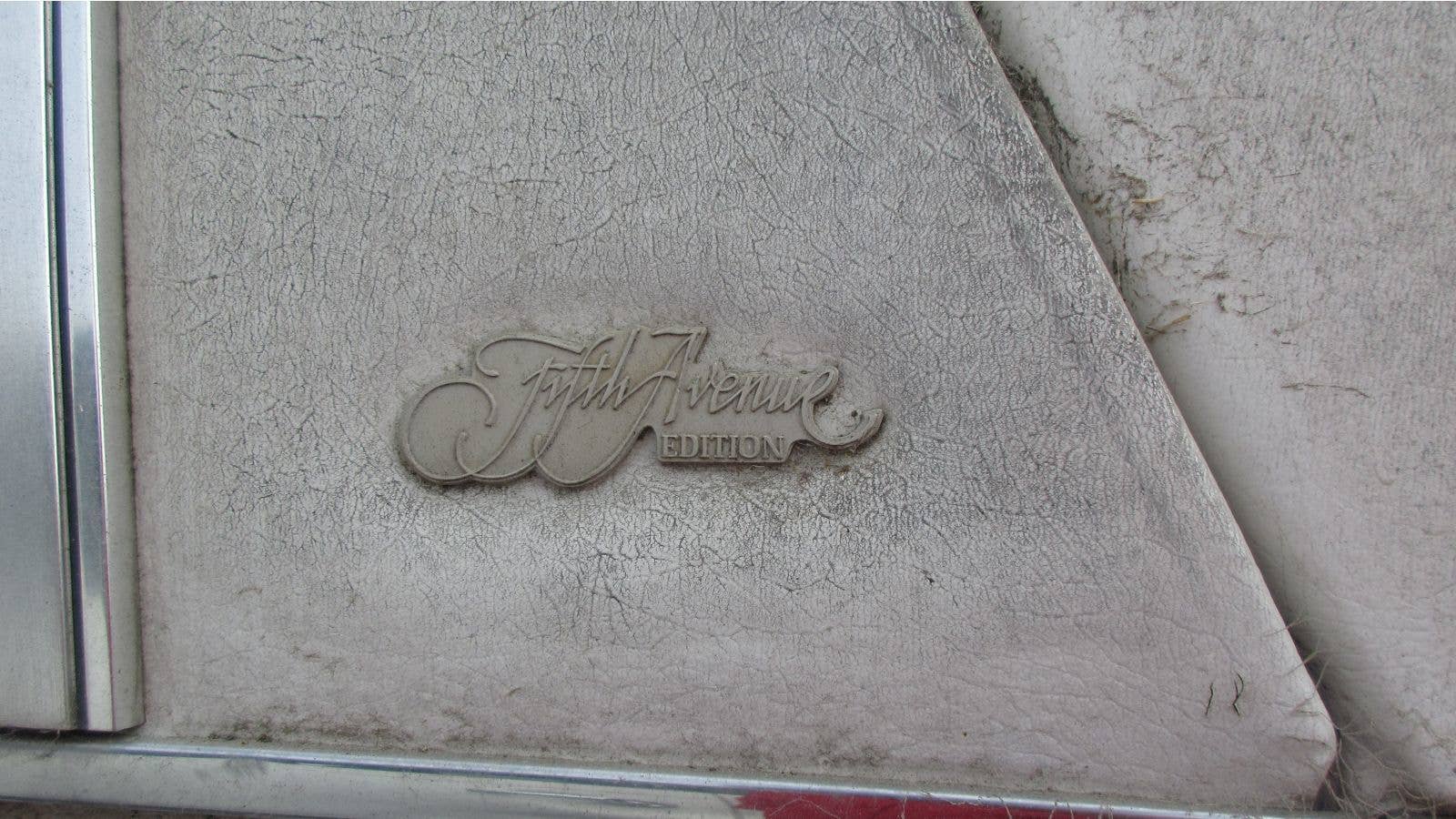 1986 Chrysler Fifth Avenue in California wrecking yard