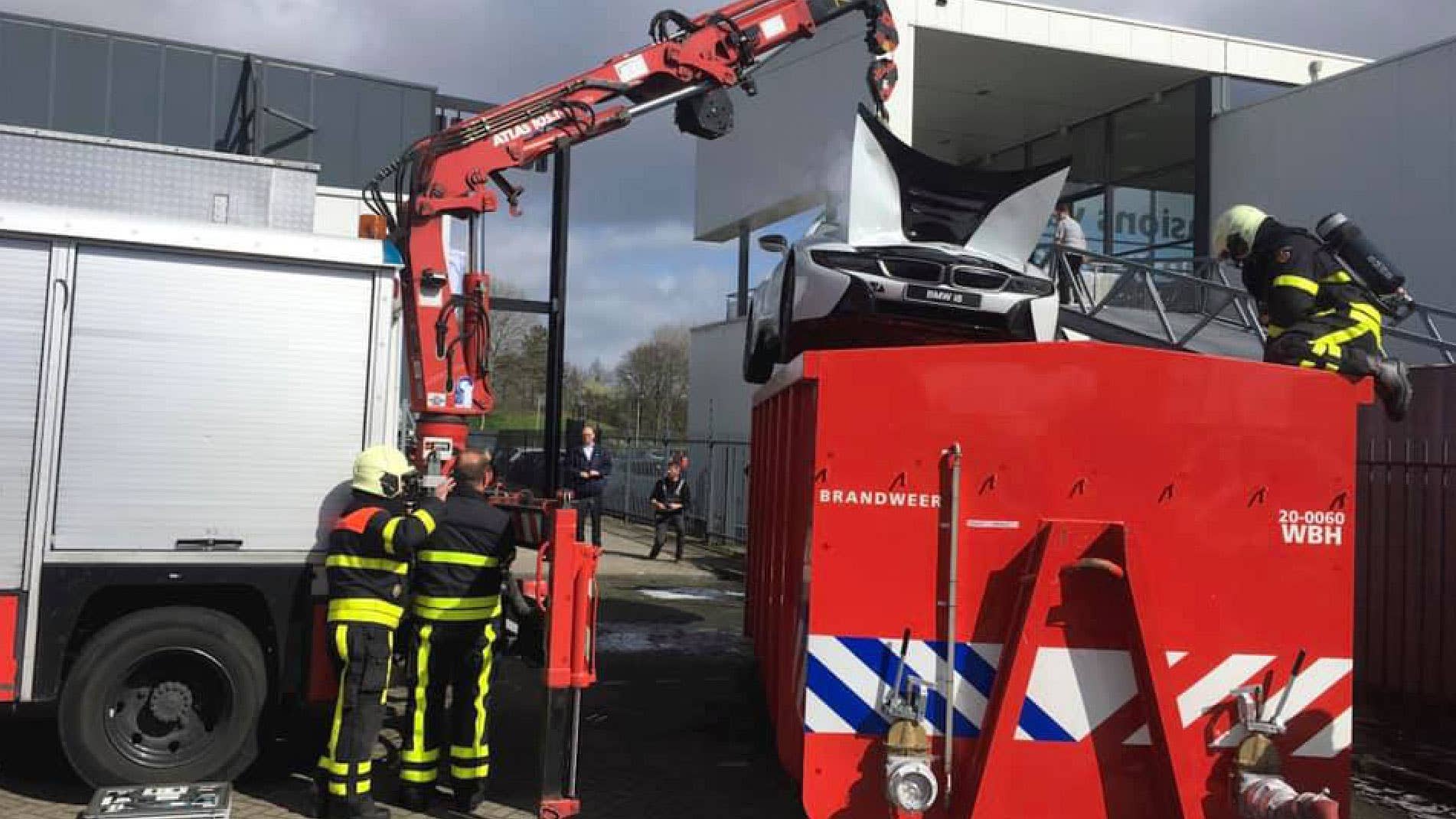 Firefighters placed a burning BMW i8 in a water tank in order to ensure the fire was out.