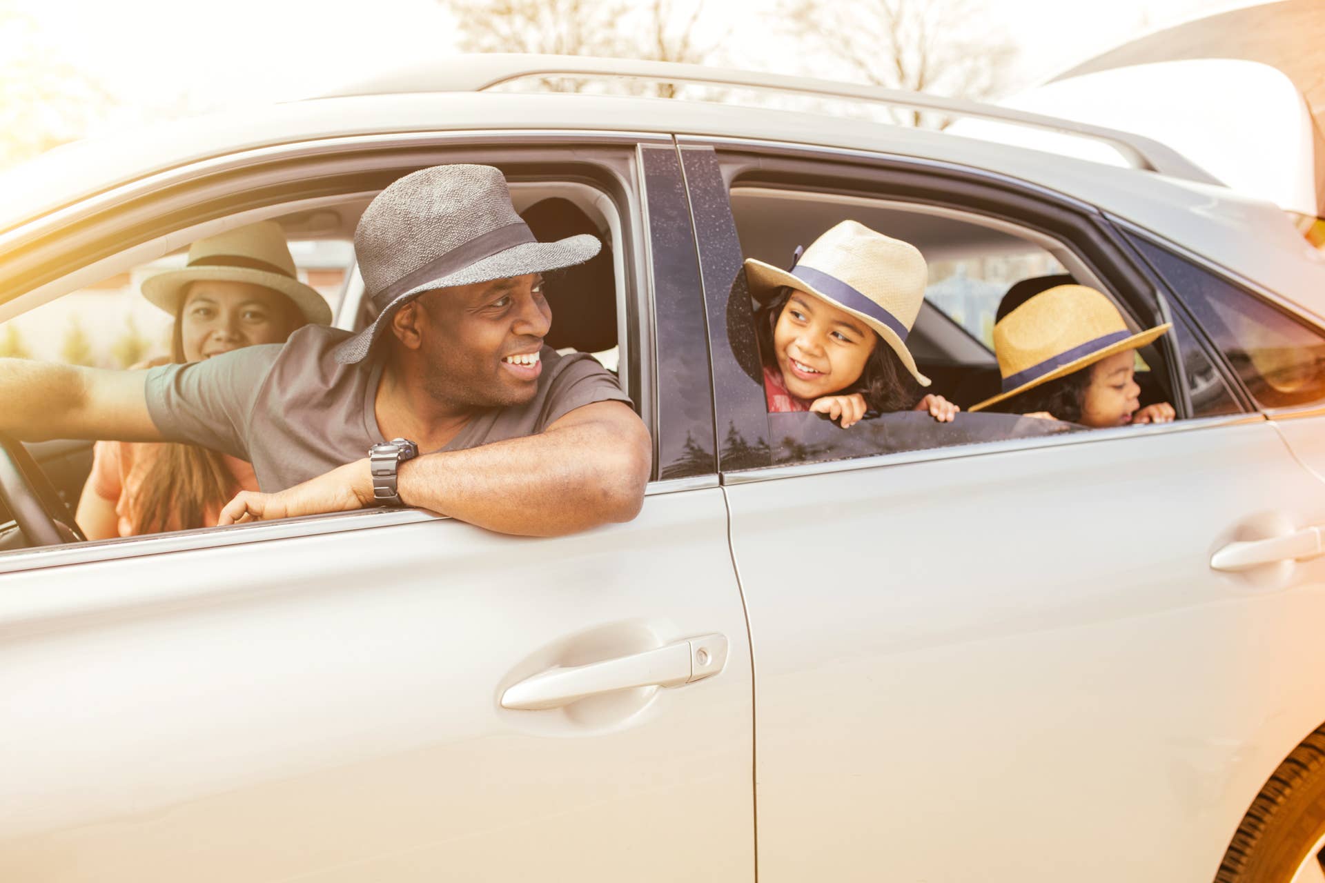 Family of four traveling by car