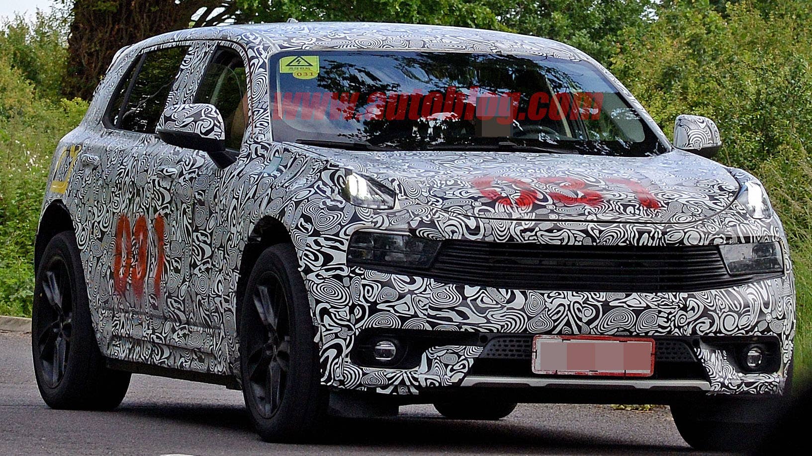 This could be the Lotus SUV underneath the Lynk and Co. body.