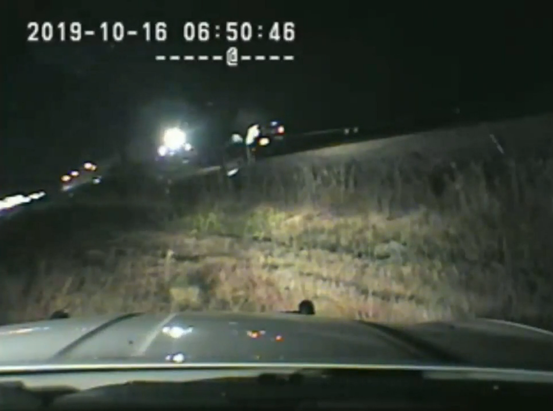 Watch trooper pull man from vehicle at last second before train hits ...