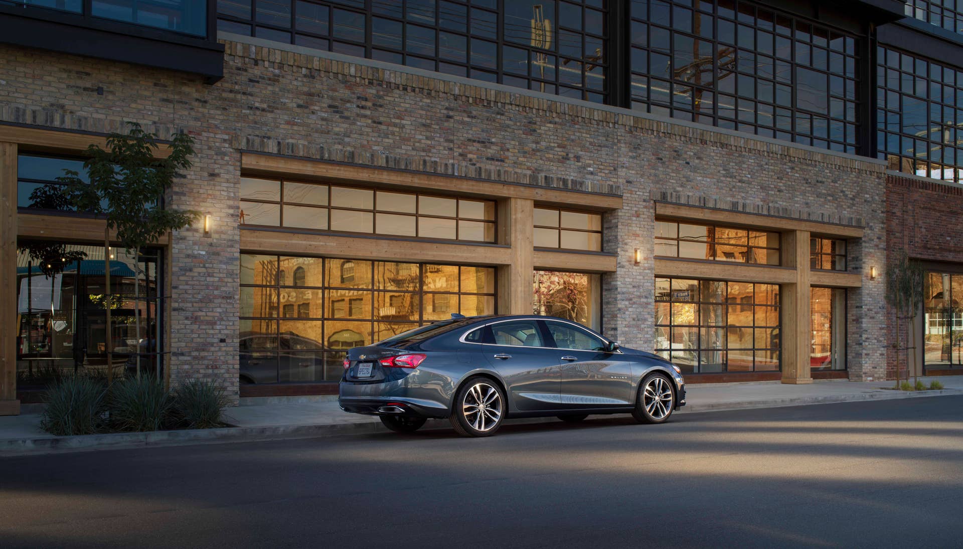 2019 Malibu Premierâs new rear valance pushes the dual-exhaust outlets farther toward the corners, emphasizing the carâs width, while new taillamps deliver a more dramatic execution of Chevroletâs signature dual-element design.