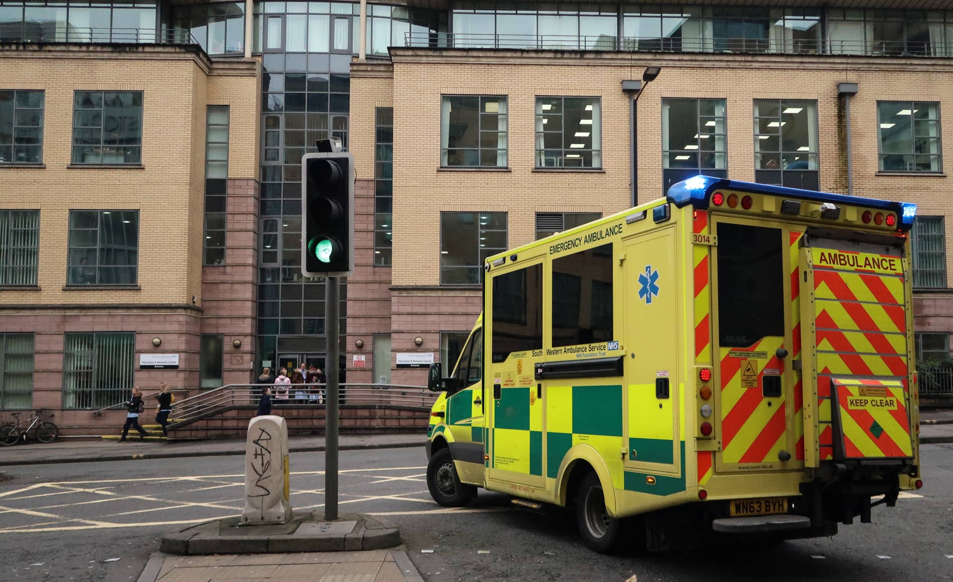 BRISTOL, ENGLAND - JANUARY 10: An ambulance leaves the Accident and Emergency department of the Bristol Royal Infirmary on January 10, 2017 in Bristol, England. According to documents leaked to the BBC record numbers of patients are facing long waits in A&Es and that nearly a quarter of all patients waited longer than the four hour target set in 2004. The figures come after the British Red Cross claims the NHS was facing a 'humanitarian crisis' this winter. (Photo by Matt Cardy/Getty Images)