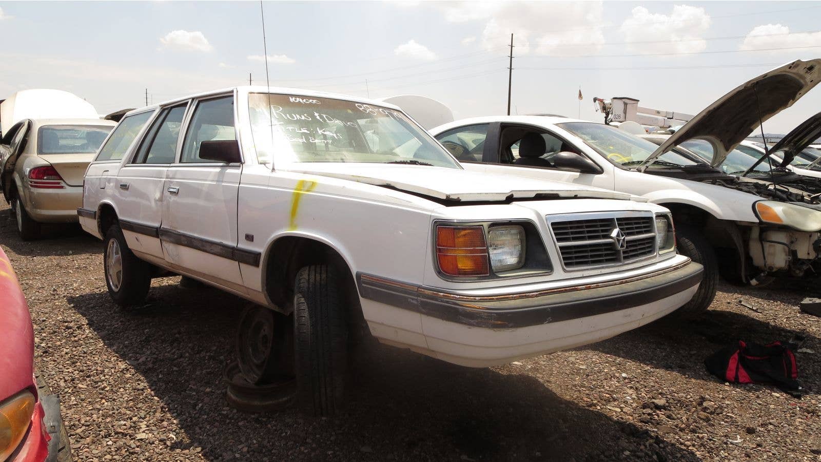Junked 1988 Dodge Aries wagon