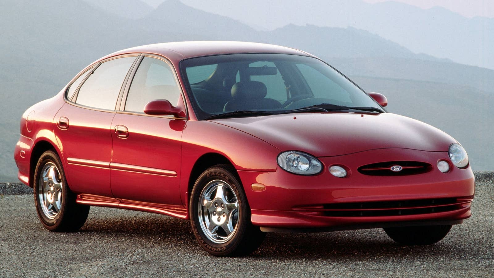 We have to give Ford credit. It was really trying with the 1996 Ford Taurus, a car that was intended to be as radical and therefore successful as its mid-80s predecessor. It would've been easy to just produce a mildly evolved and similarly square Taurus, but the company tried to instead be fashion forward. This car really was shocking, and although it still sold in big numbers, it never approached its predecessor. Its over-the-top, ovals inside-and-out design motif clearly was the main reason for that.