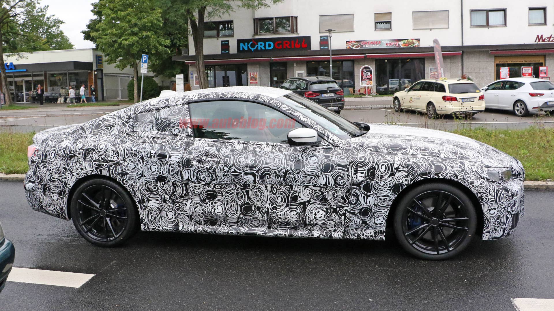 BMW 4 Series coupe in camouflage