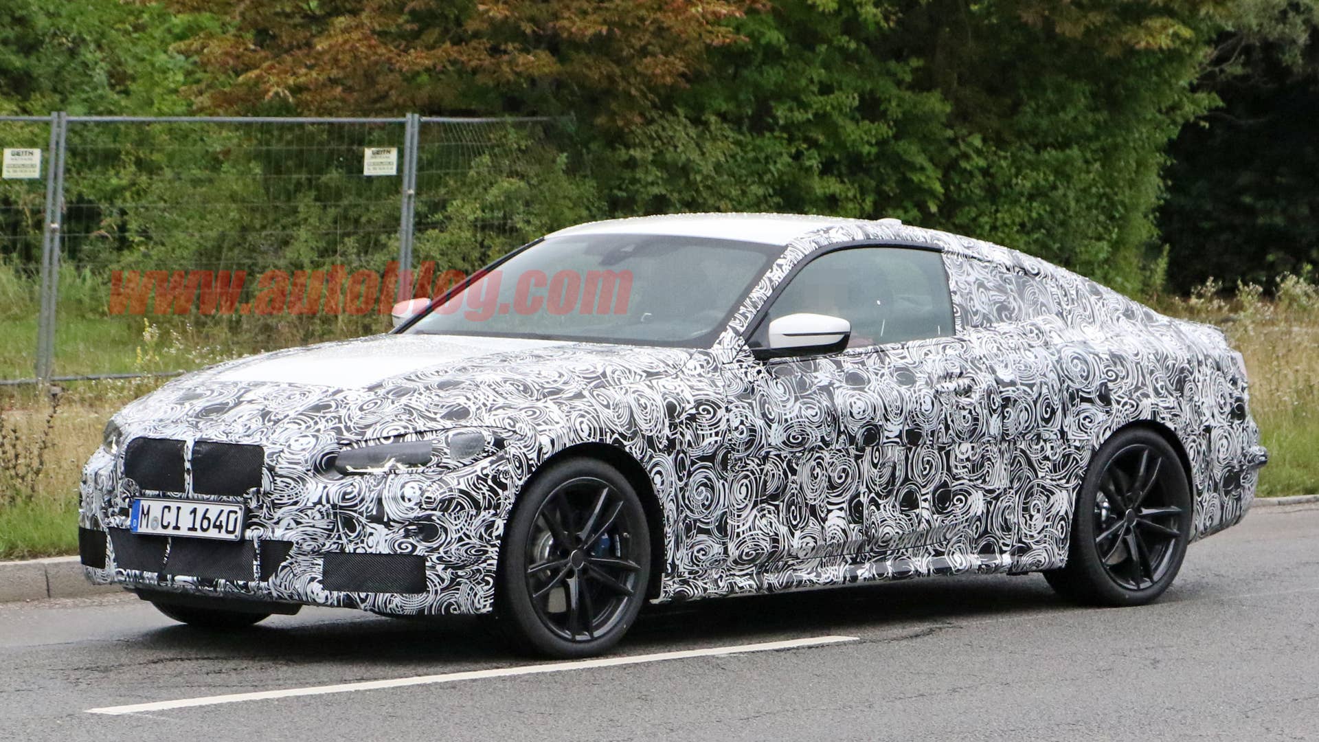 BMW 4 Series coupe in camouflage