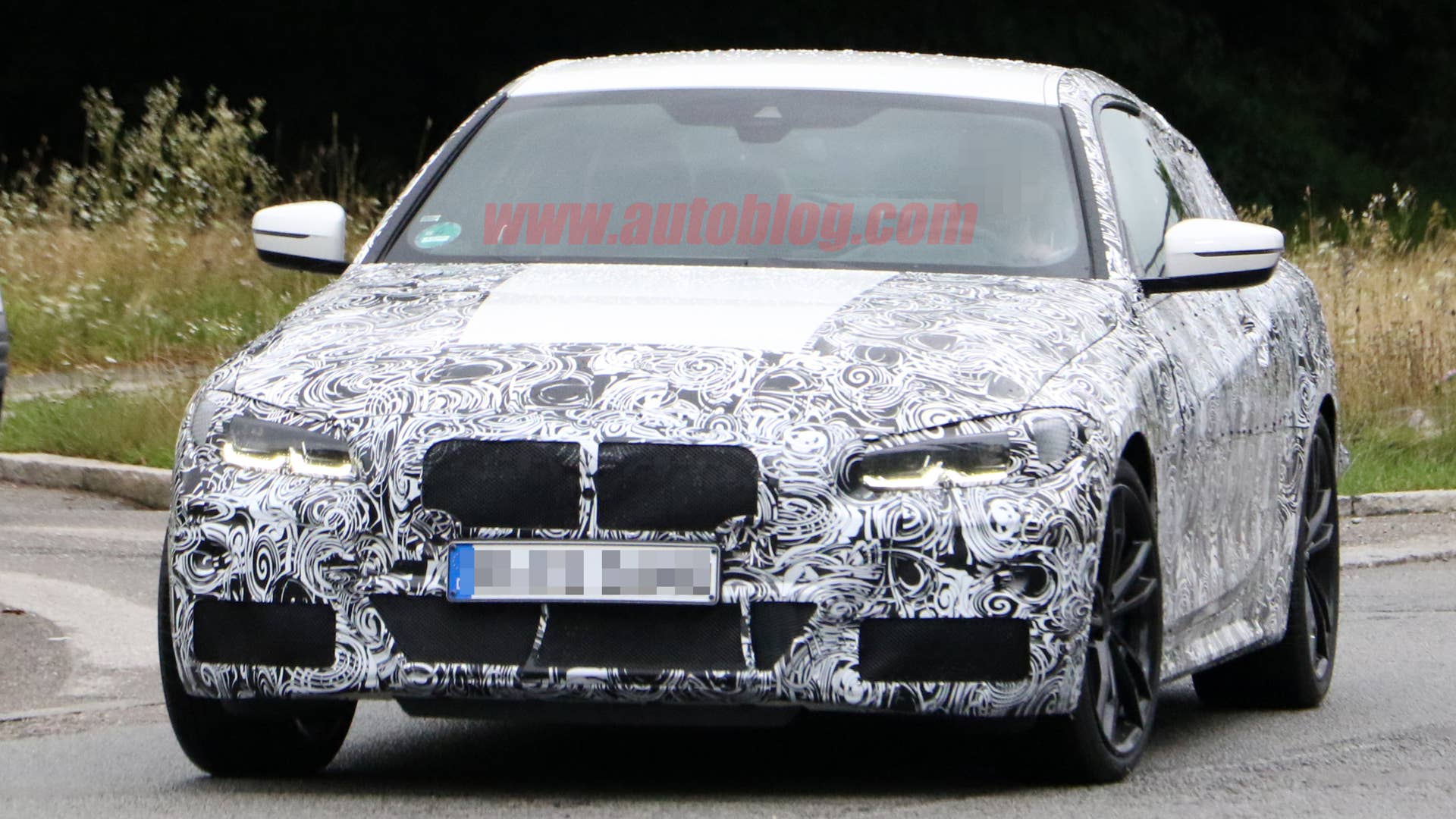 BMW 4 Series coupe in camouflage