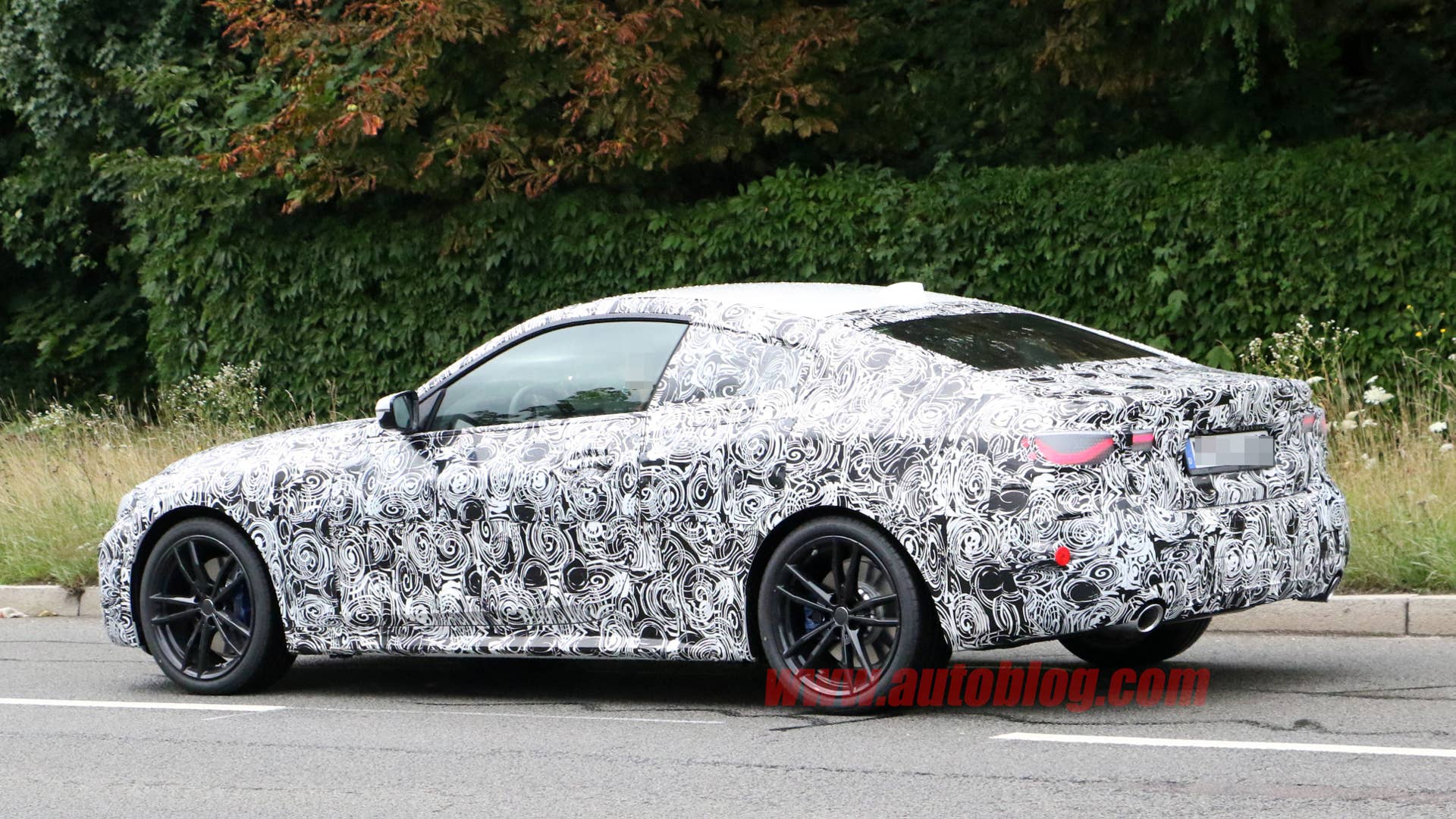 BMW 4 Series coupe in camouflage