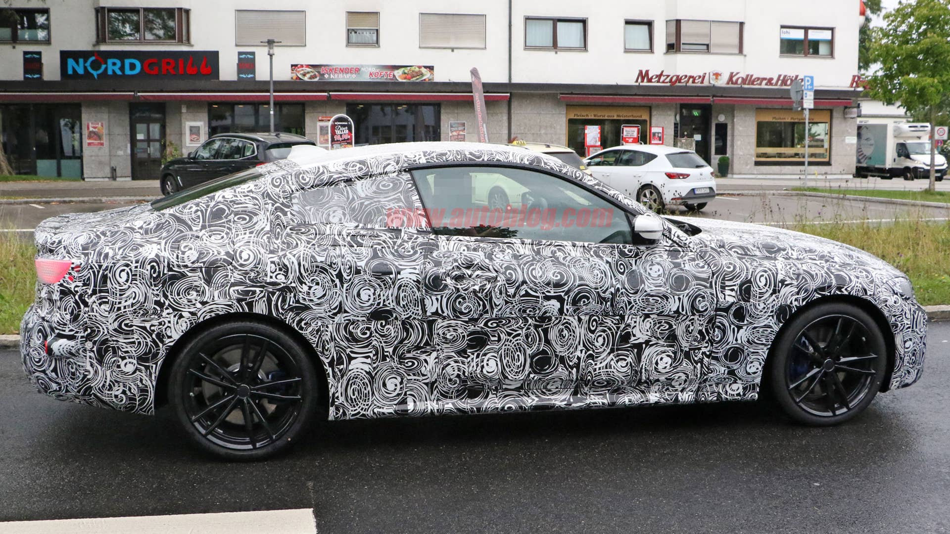 BMW 4 Series coupe in camouflage