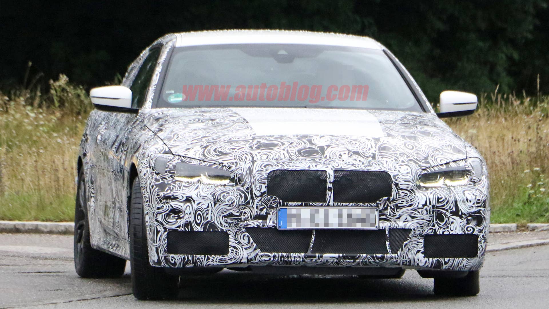 BMW 4 Series coupe in camouflage