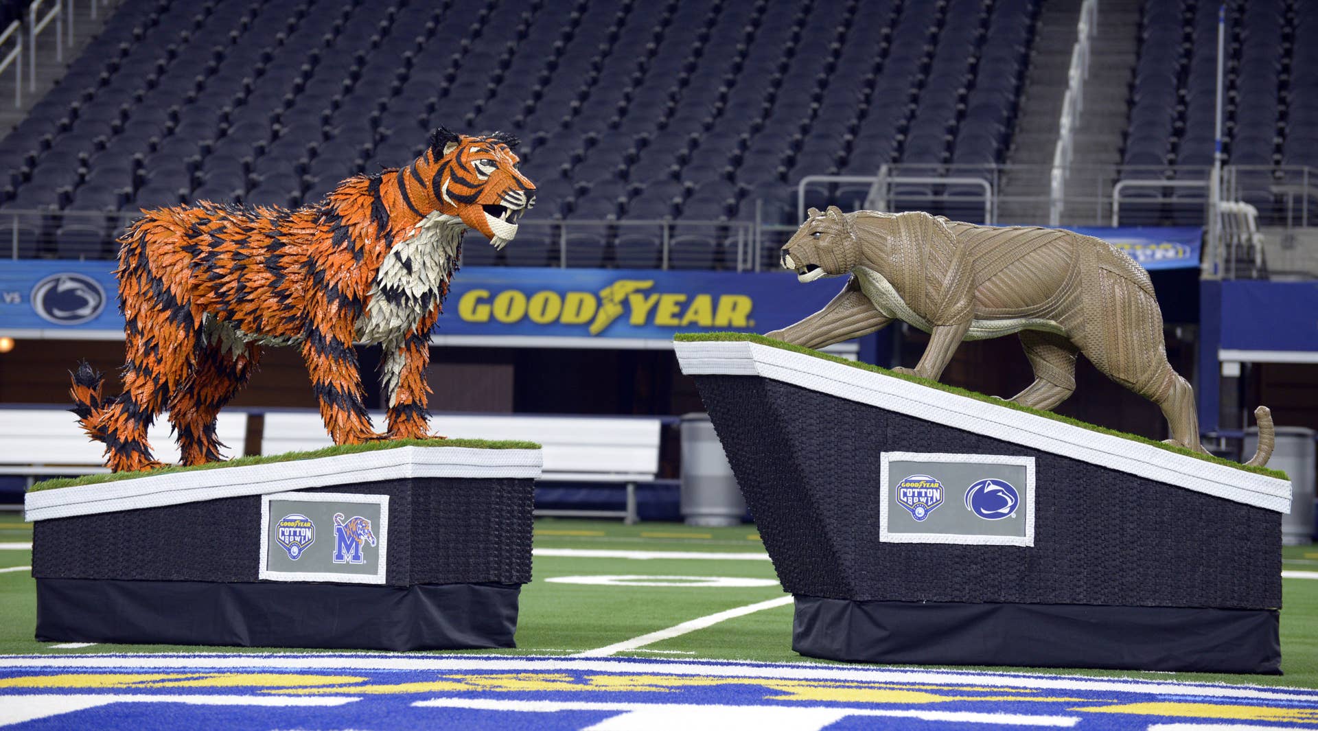 To celebrate the drive it takes to advance to the 84th annual Goodyear Cotton Bowl Classic, title sponsor Goodyear unveils life-sized tire sculptures of Penn State University’s mascot, the Nittany Lion, and the University of Memphis’ mascot, Tom the Tiger on Thursday, Dec. 26, 2019. Handcrafted by tire artist Blake McFarland, they will serve as centerpieces for the Goodyear Cotton Bowl Classic on Dec. 28, 2019, at AT&T Stadium in Arlington, Texas. (Matt Strasen/AP Images for Goodyear) (PRNewsfoto/The Goodyear Tire & Rubber Comp)