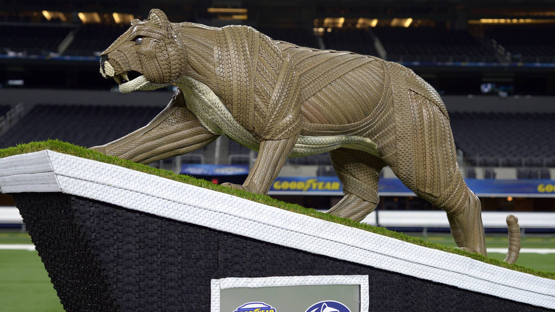 Goodyear introduces a life-sized tire mascot sculpture of the Penn State University Nittany Lion on Thursday, Dec. 26, 2019, at AT&T Stadium in Arlington, Texas. Standing five feet tall and made from more than 100 Goodyear tires, the Penn State Nittany Lion sculpture took over 200 total hours to complete. The statue recognizes the drive and effort of the Penn State University players and coaches for advancing to the 84th annual Goodyear Cotton Bowl Classic. (Matt Strasen/AP Images for Goodyear) (PRNewsfoto/The Goodyear Tire & Rubber Comp)