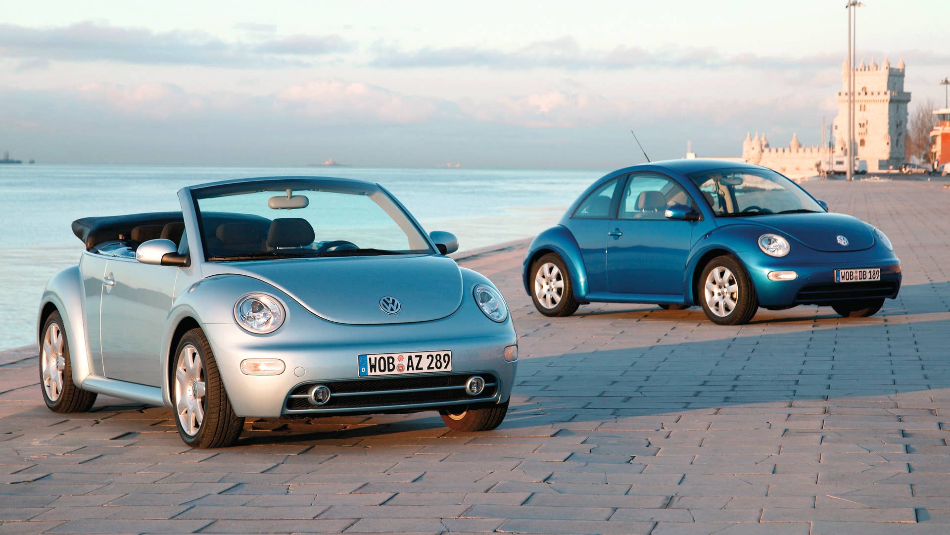 Volkswagen New Beetle and New Beetle Cabriolet on the beach